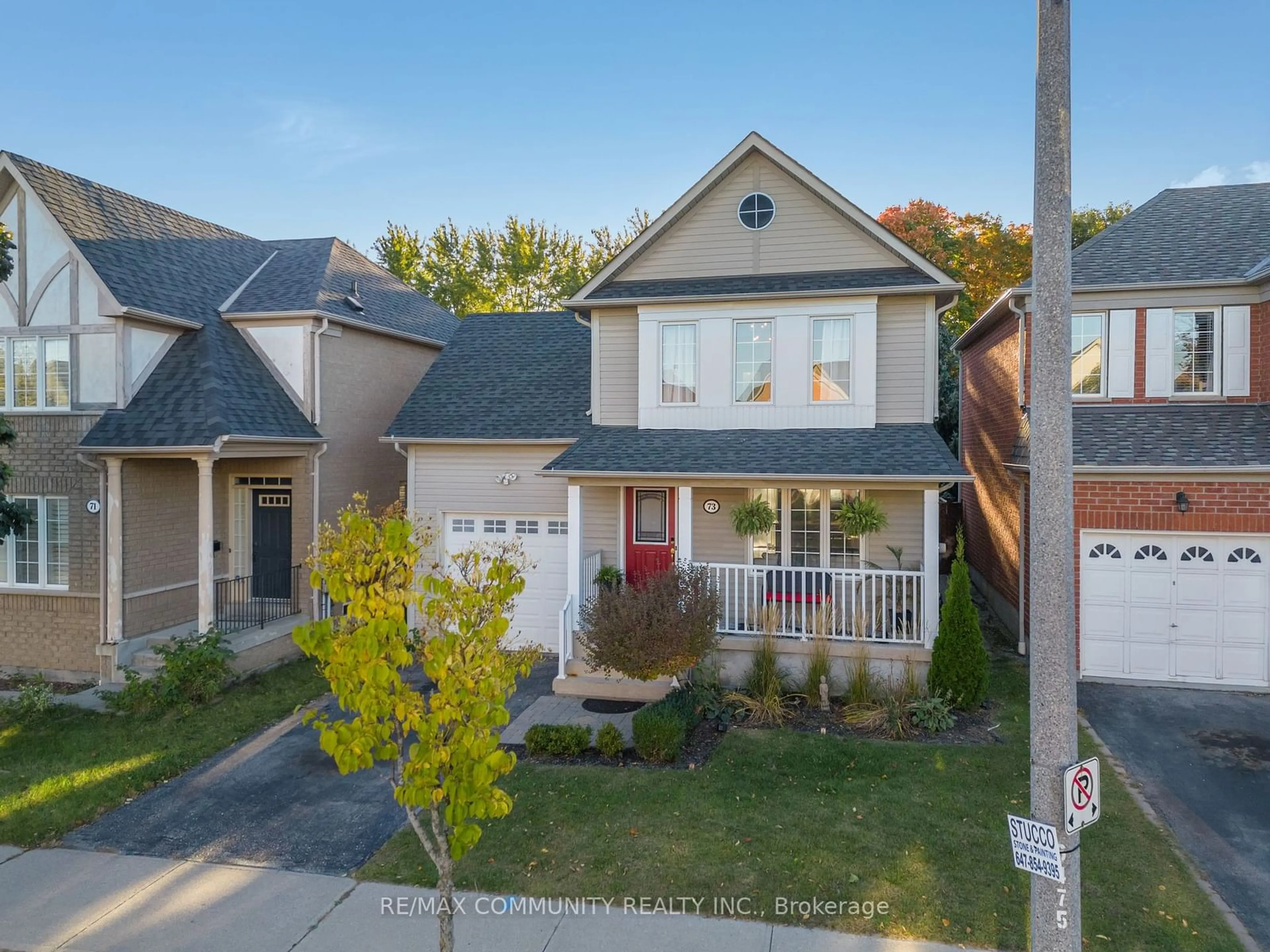 Frontside or backside of a home, the street view for 73 McSweeney Cres, Ajax Ontario L1T 4G2