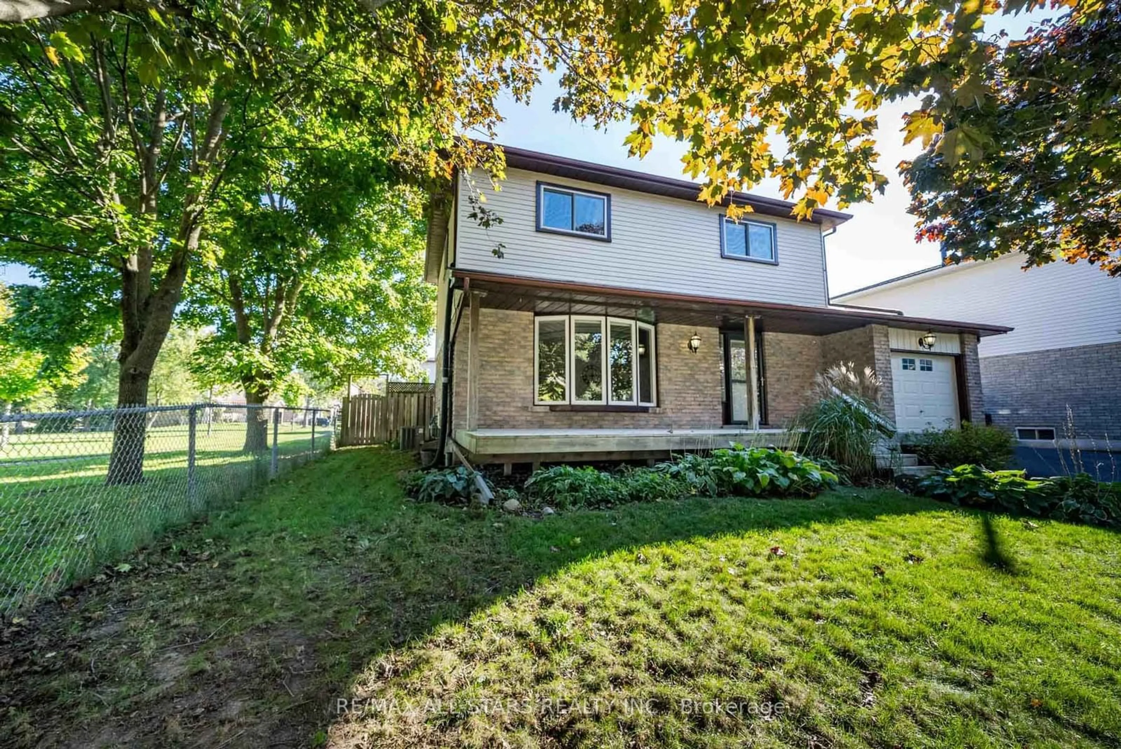 Frontside or backside of a home, the fenced backyard for 90 Chester Cres, Scugog Ontario L9L 1K8