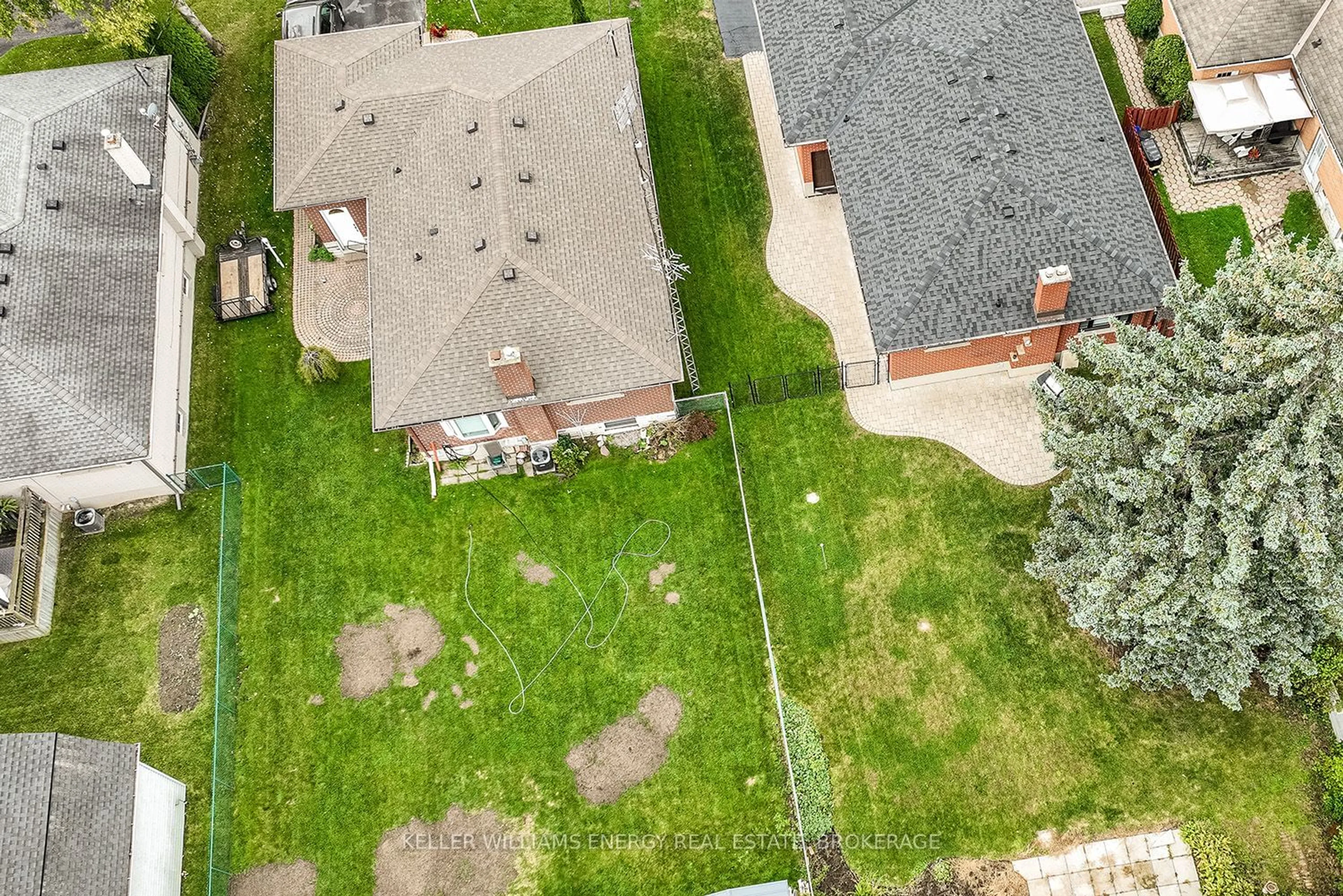 Frontside or backside of a home, the fenced backyard for 159 Scugog St, Clarington Ontario L1C 3J7