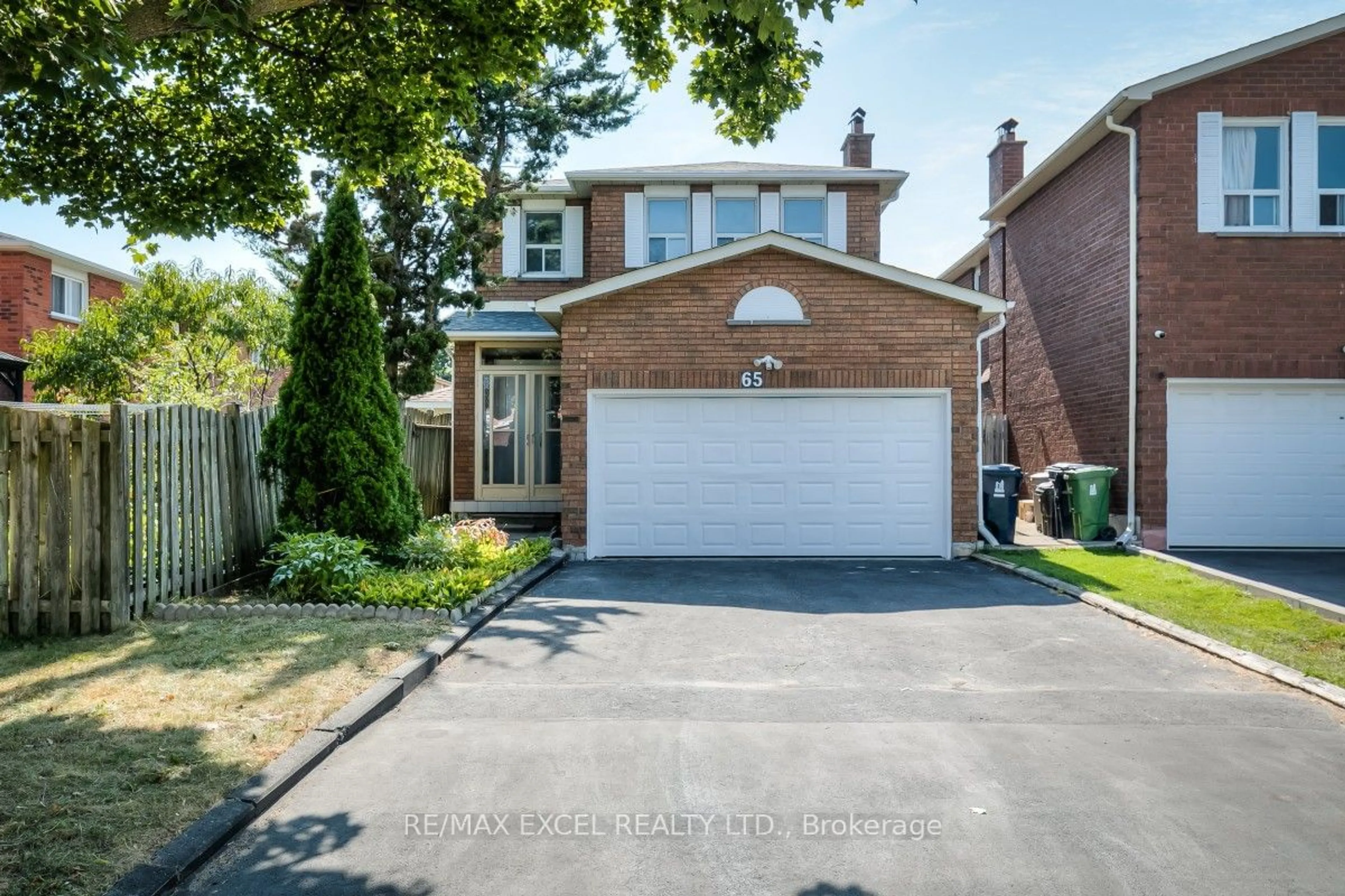 Frontside or backside of a home, the street view for 65 Alanbull Sq, Toronto Ontario M1V 4M2