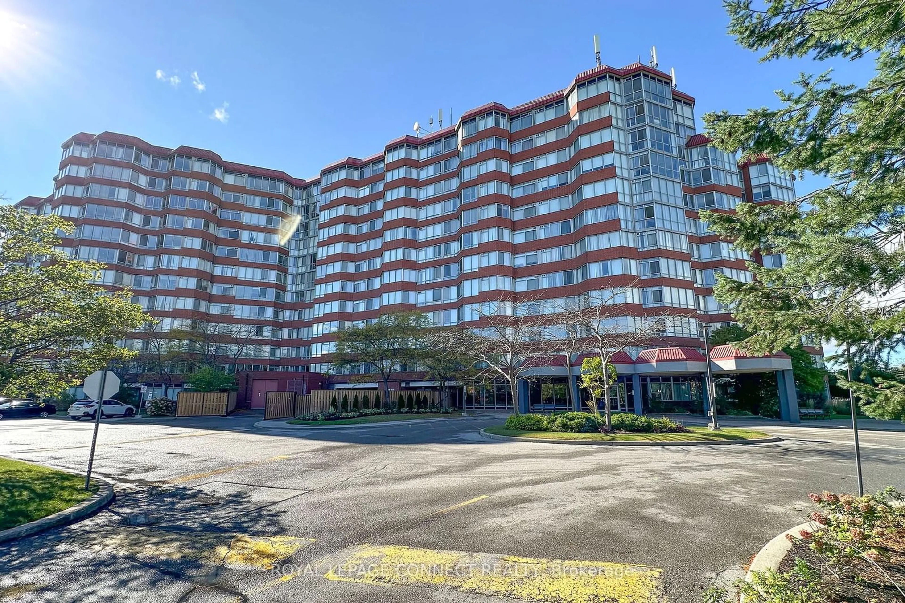 A pic from exterior of the house or condo, the street view for 11753 Sheppard Ave #803, Toronto Ontario M1B 5M3