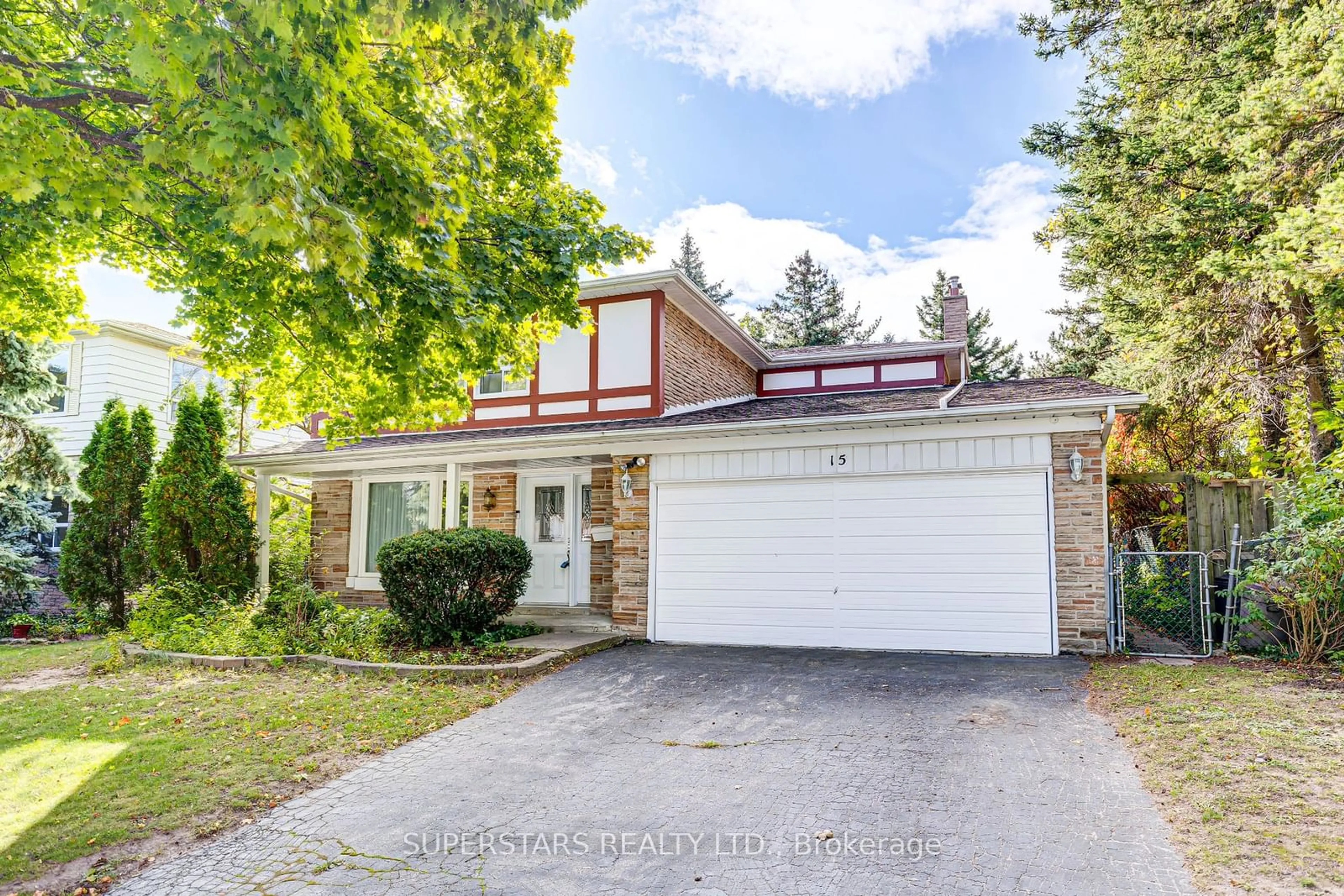 Frontside or backside of a home, the street view for 15 Pipers Green Ave, Toronto Ontario M1S 3J9