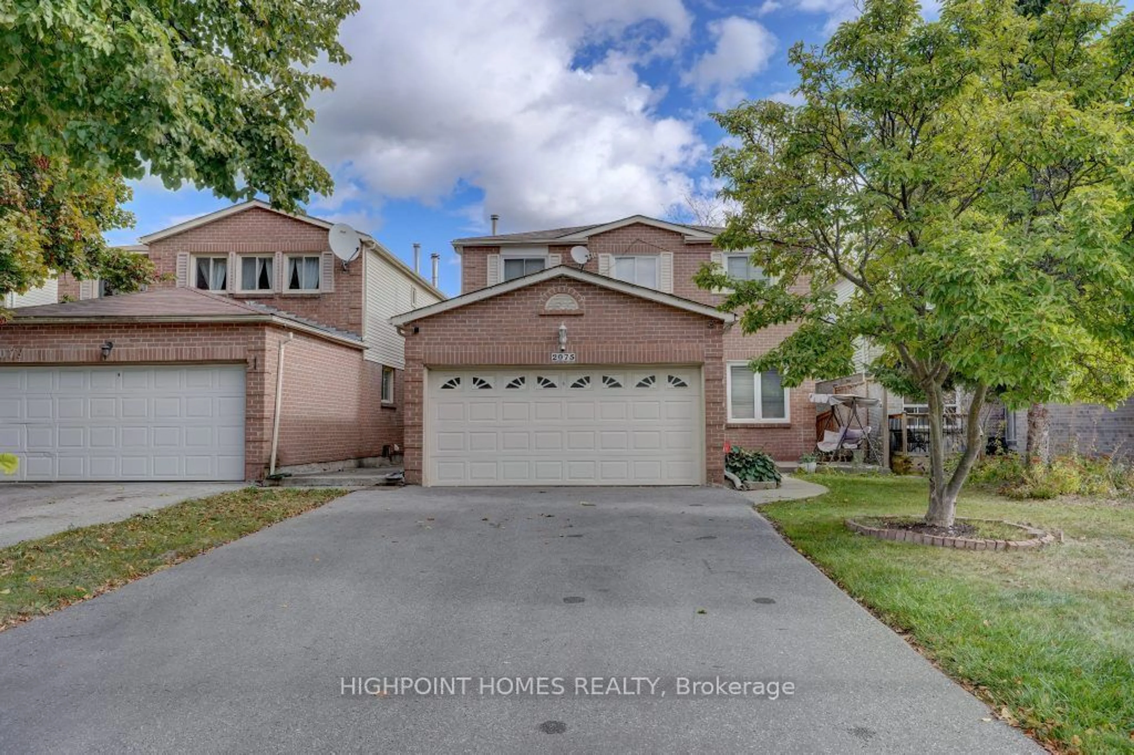 Frontside or backside of a home, the street view for 2075 Duberry Dr, Pickering Ontario L1X 1Y7