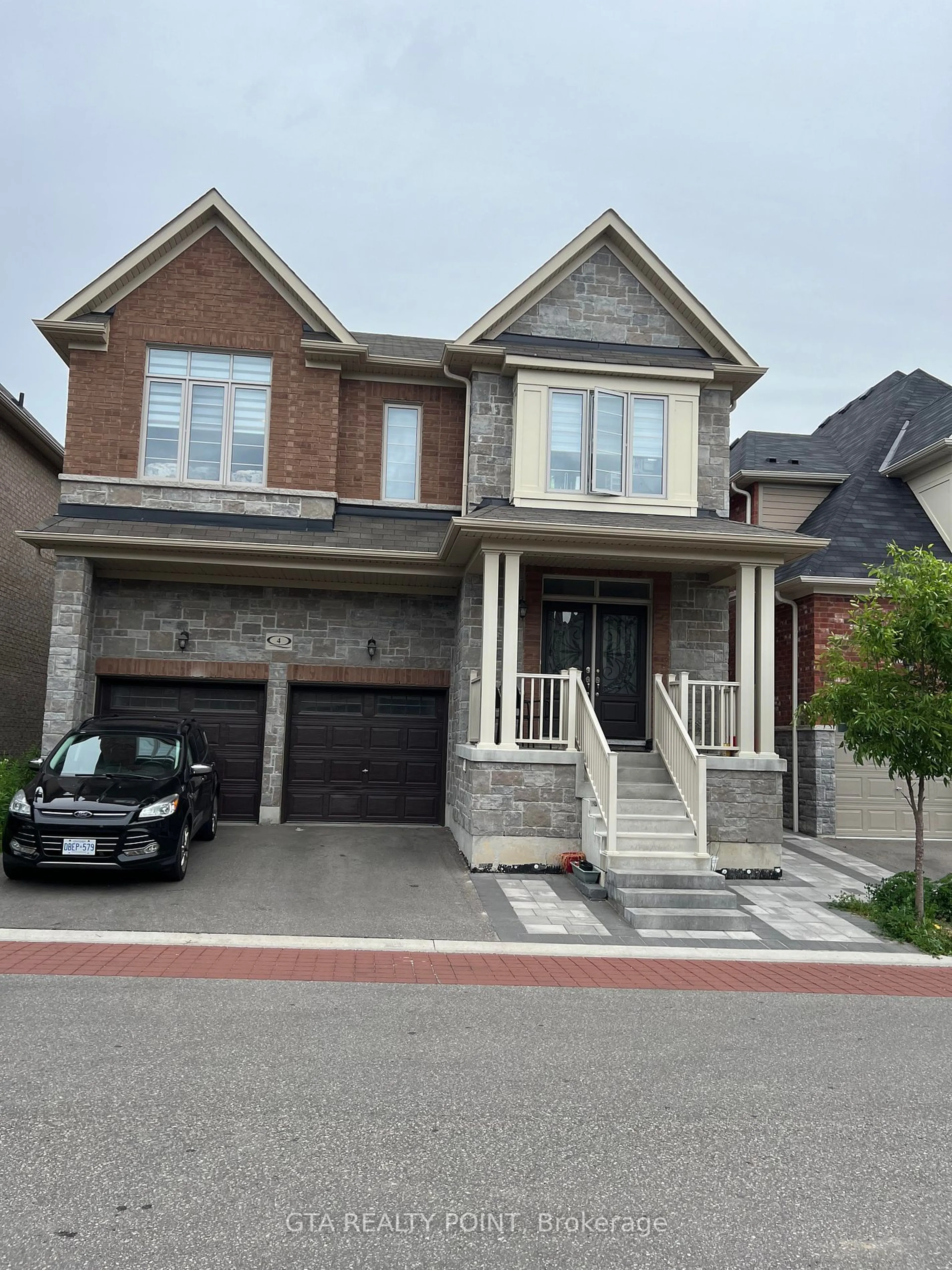 Home with brick exterior material for 4 Hassard Short Lane, Ajax Ontario L1S 0C4