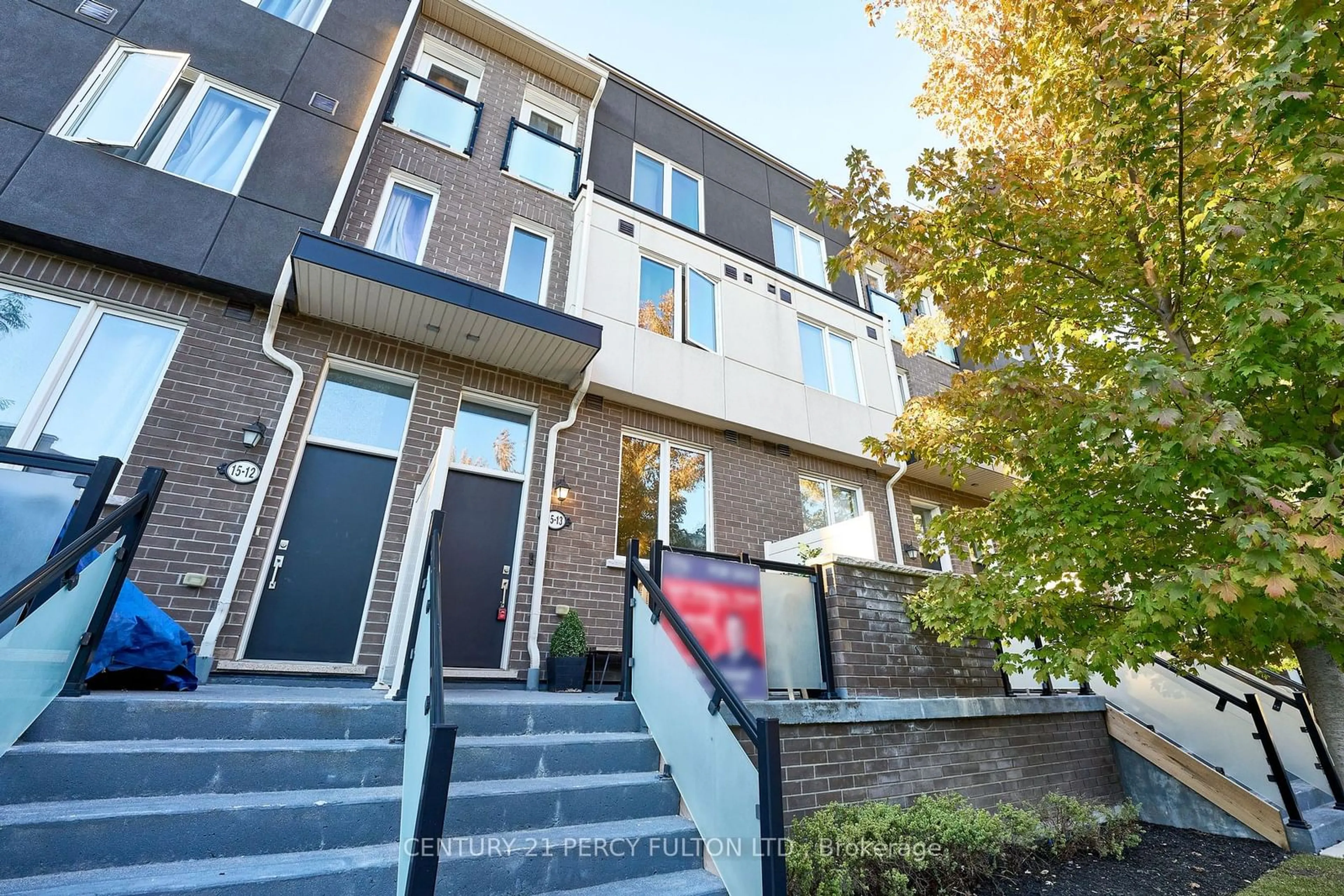 A pic from exterior of the house or condo, the front or back of building for 15 Heron Park Pl #13, Toronto Ontario M1E 0B8