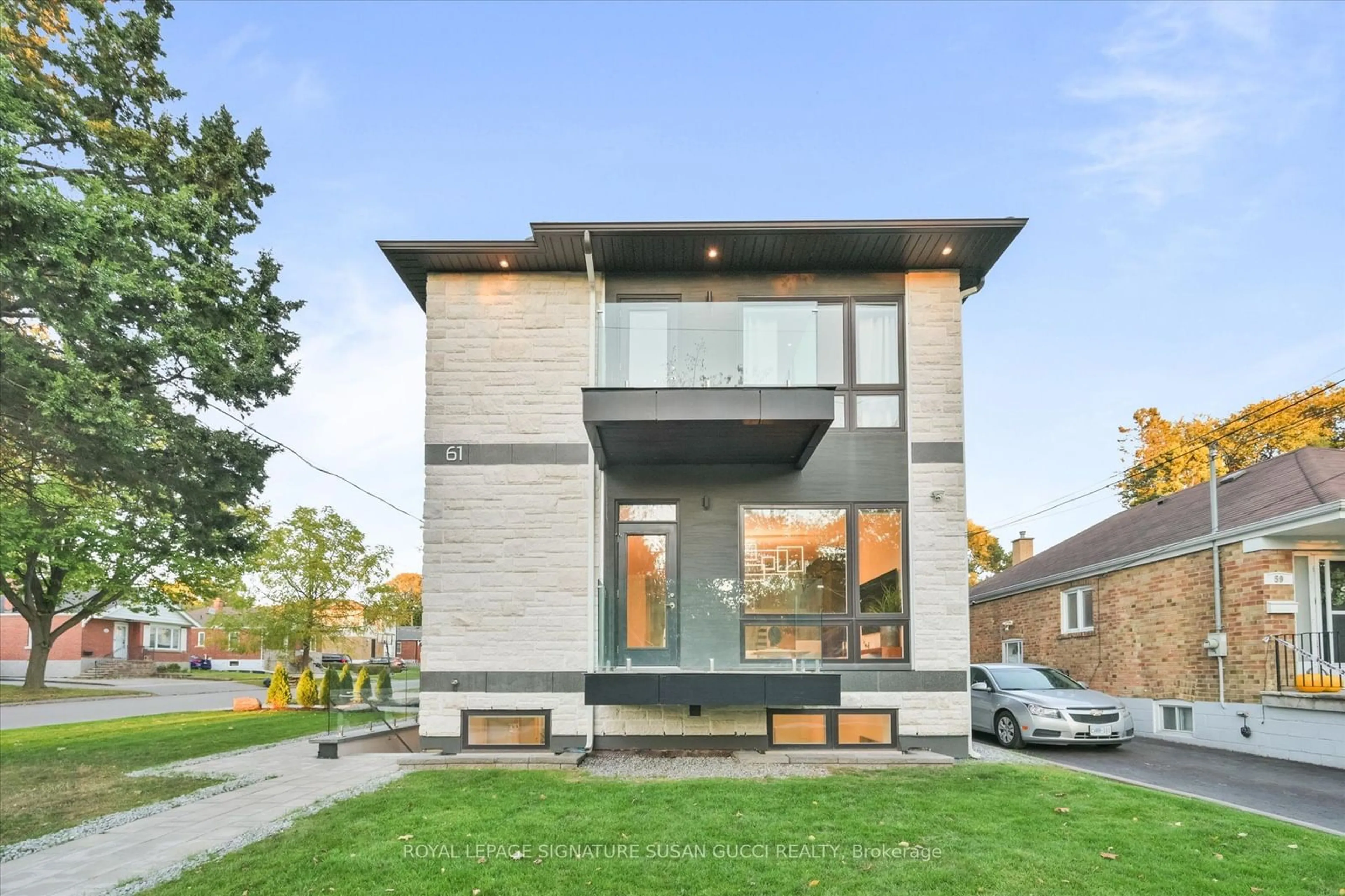 Home with brick exterior material for 61 Presley Ave, Toronto Ontario M1L 3P4