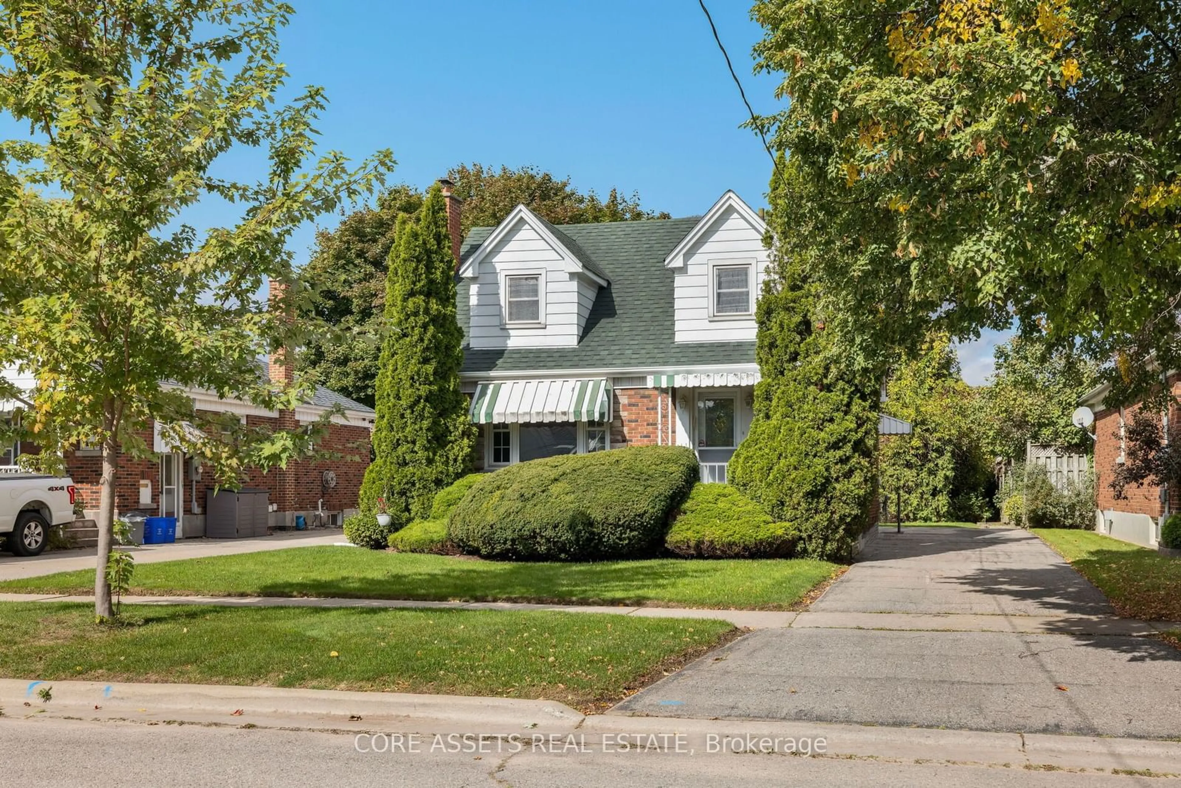 Frontside or backside of a home, the street view for 400 Elgin St, Oshawa Ontario L1G 1T9