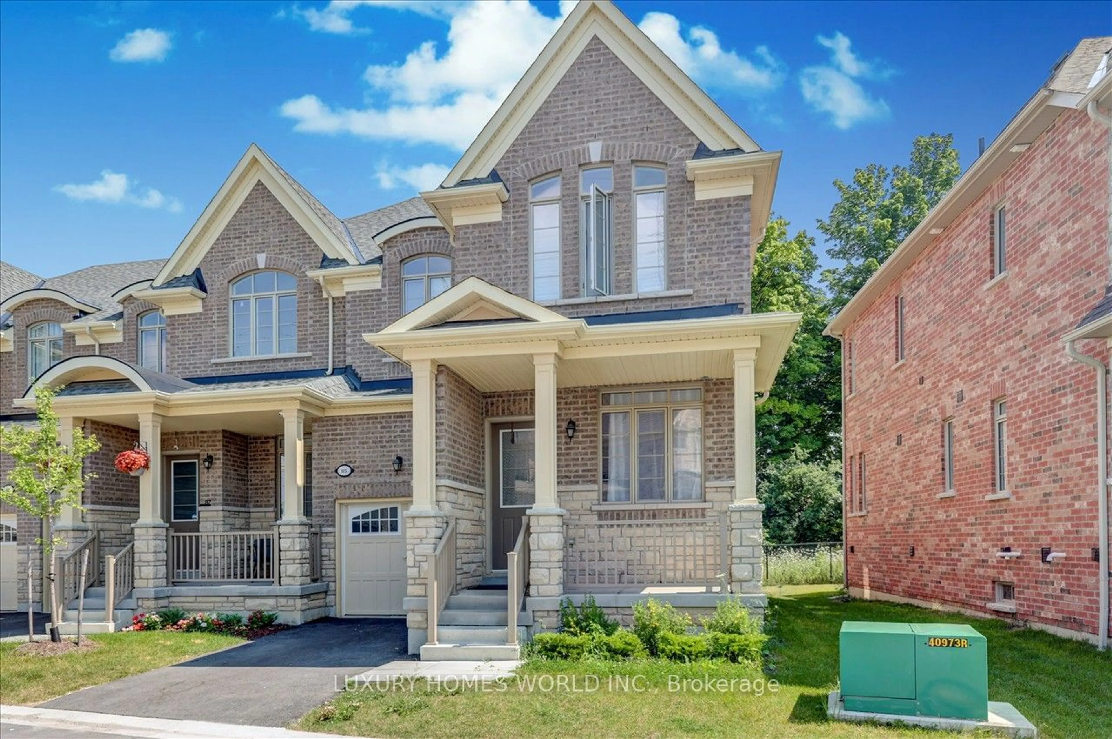 Home with brick exterior material for 85 Hickling Lane, Ajax Ontario L1T 0P9