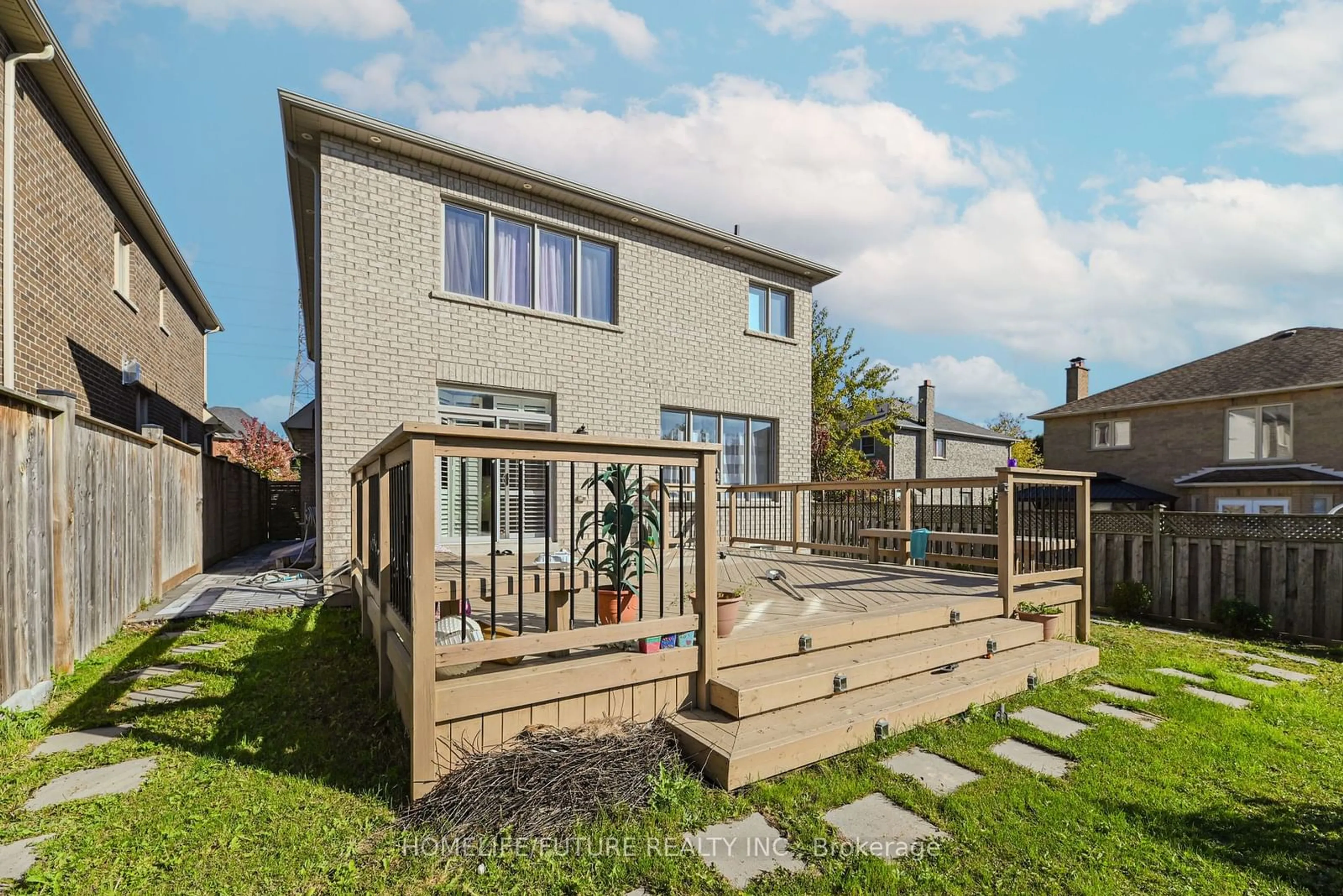 Frontside or backside of a home, the fenced backyard for 153 Braebrook Dr, Whitby Ontario L1R 0M9