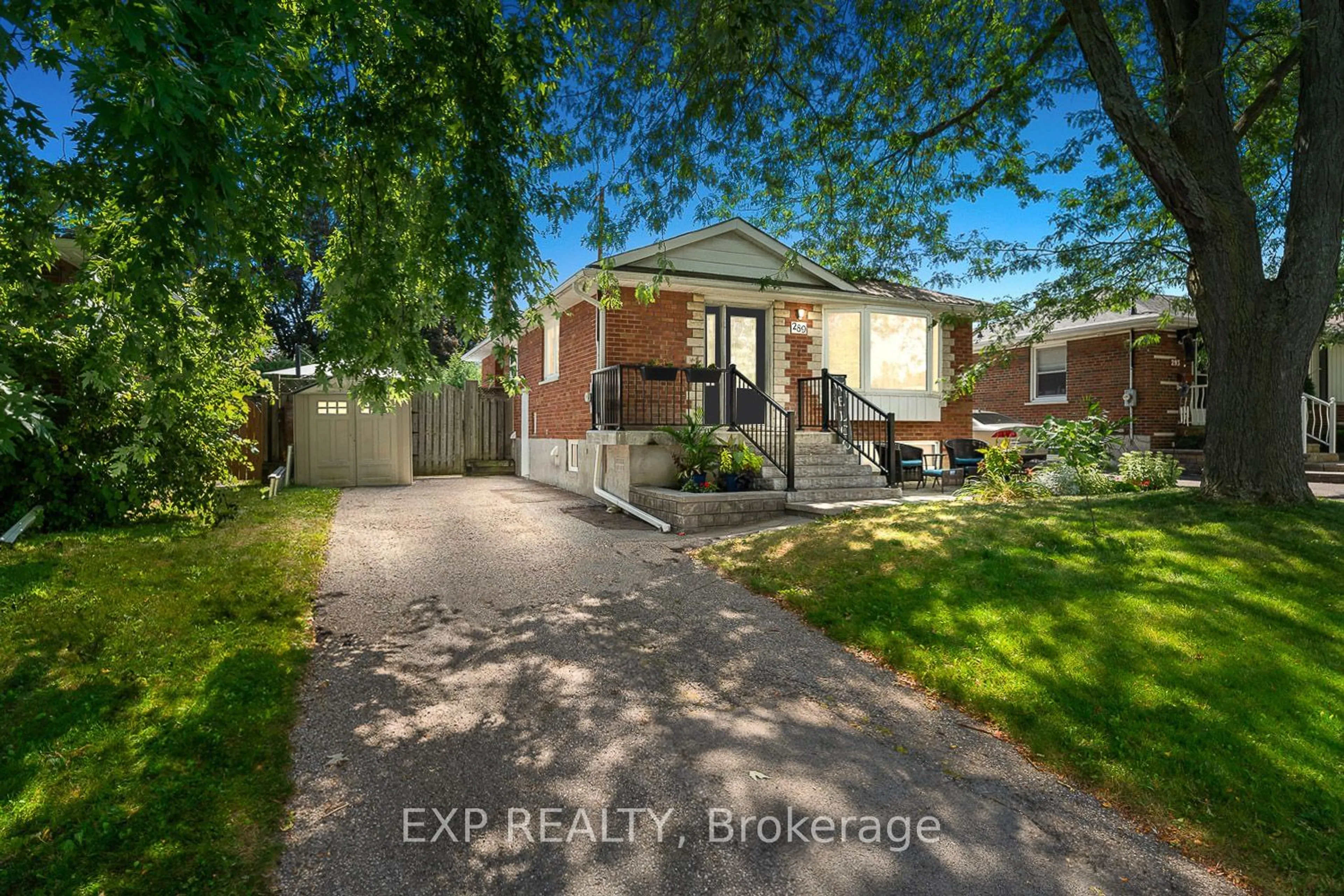 Frontside or backside of a home, the fenced backyard for 289 Ridgeway Ave, Oshawa Ontario L1J 2T9