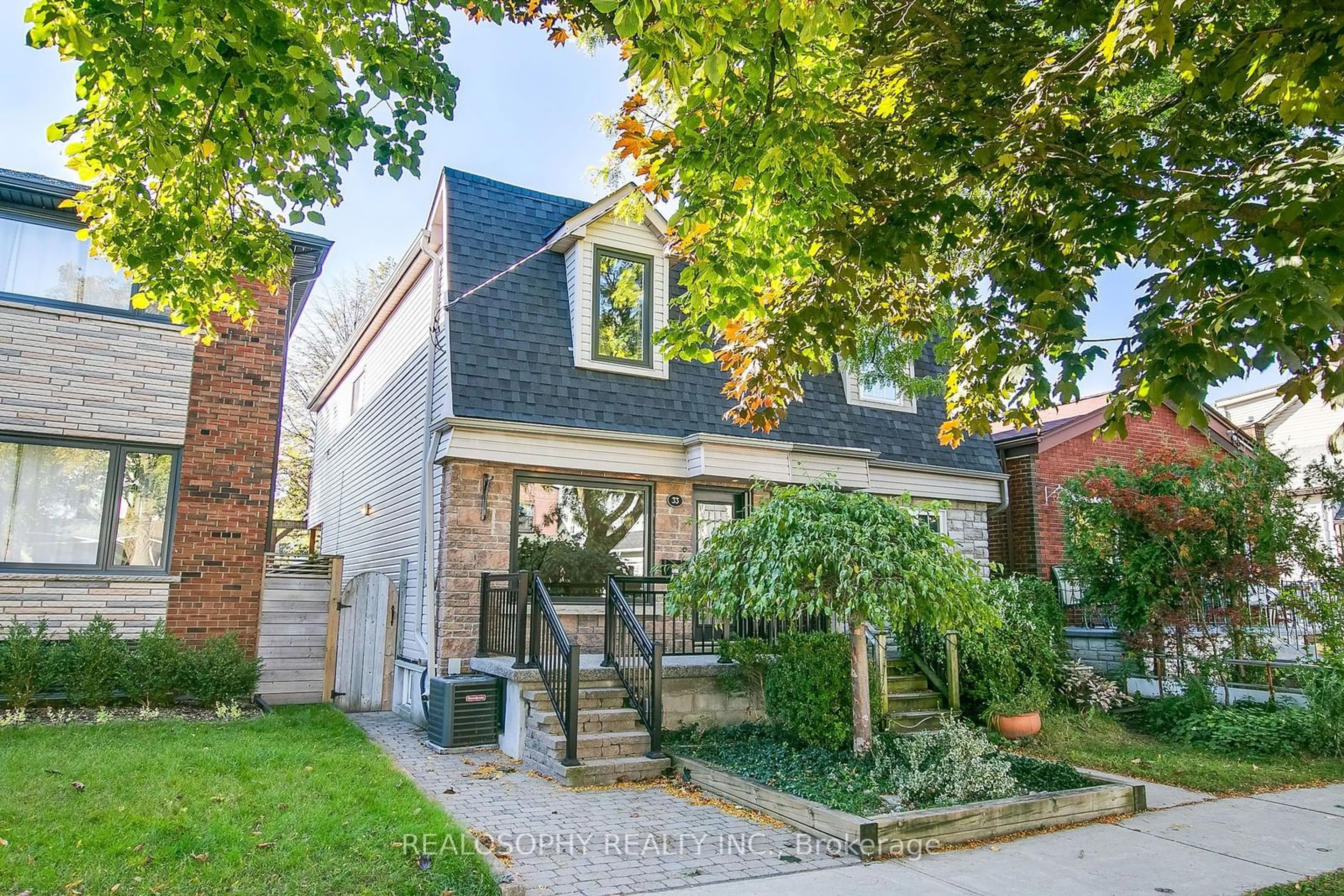 Home with brick exterior material for 33 Sammon Ave, Toronto Ontario M4J 1Y7