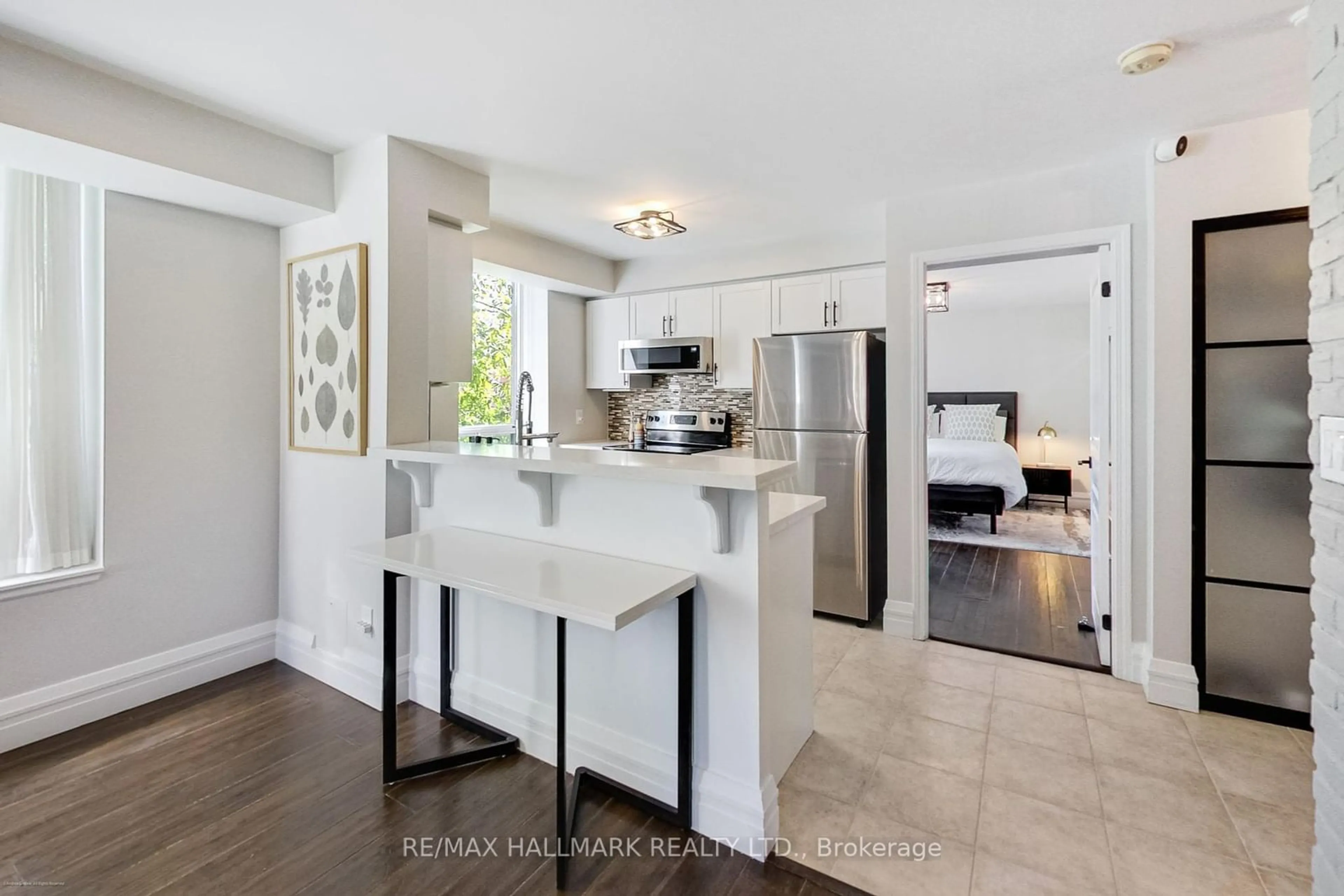 Open concept kitchen for 1733 Queen St #220, Toronto Ontario M4L 6S9