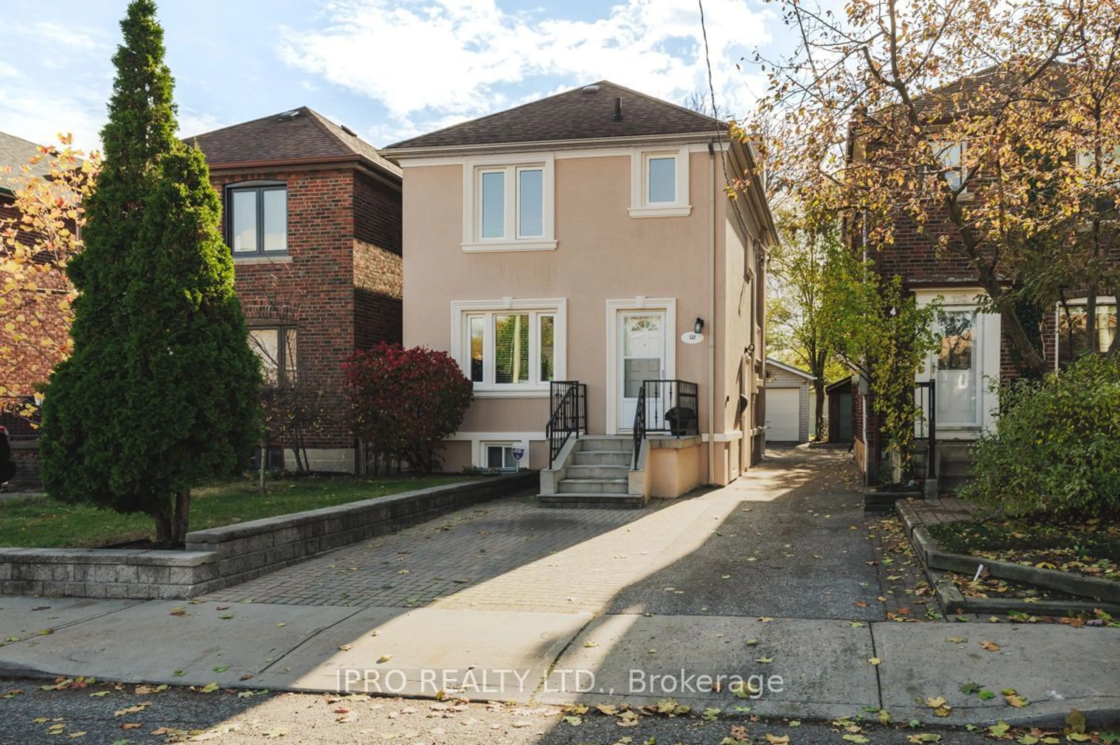 Frontside or backside of a home, the street view for 121 Memorial Park Ave, Toronto Ontario M4J 2K2