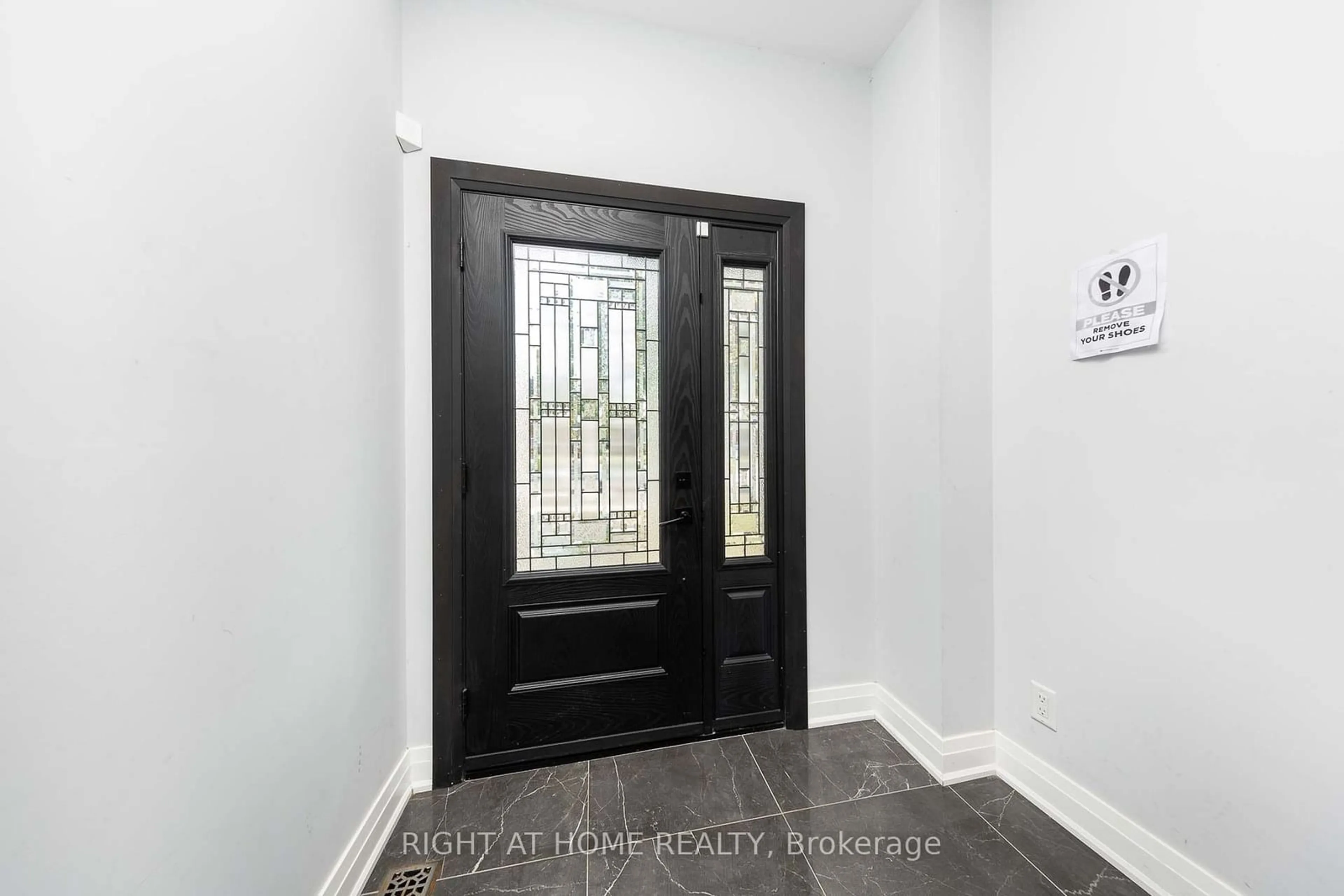 Indoor entryway, wood floors for 574A Pharmacy Ave, Toronto Ontario M1L 3G9