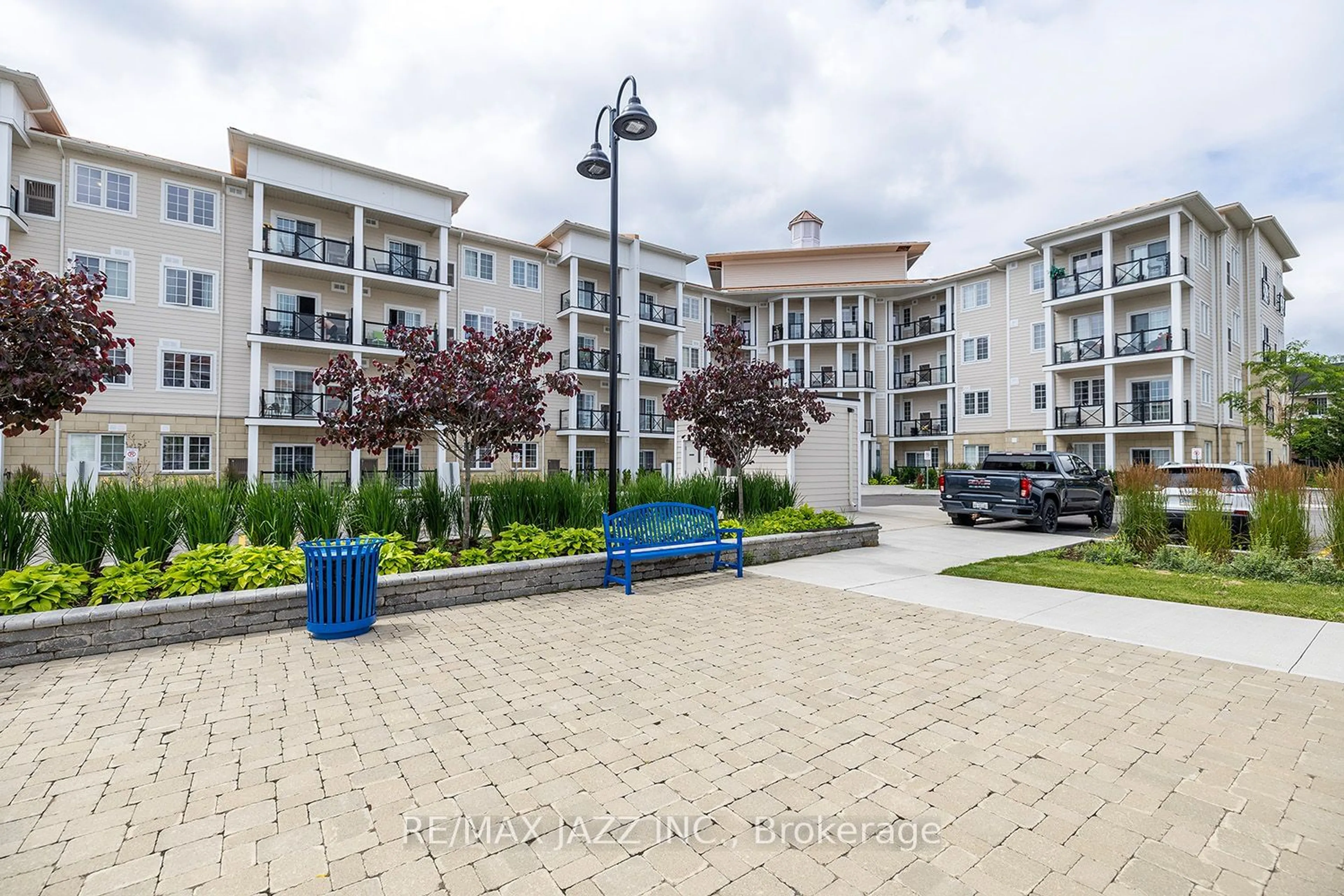 A pic from exterior of the house or condo, the street view for 50 Lakebreeze Dr #401, Clarington Ontario L1B 0V9