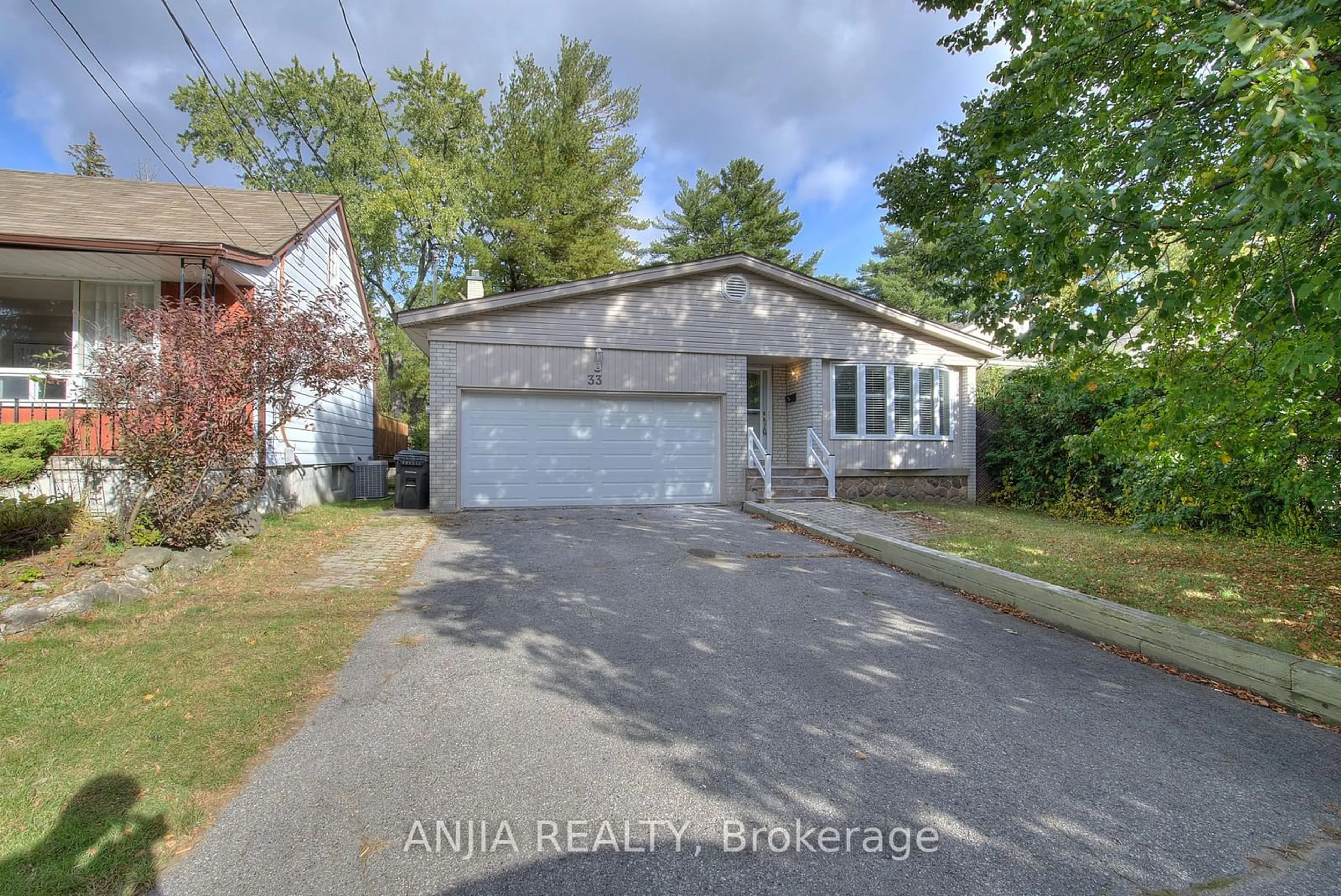 Frontside or backside of a home, the street view for 33 Conlins Rd, Toronto Ontario M1C 1C2