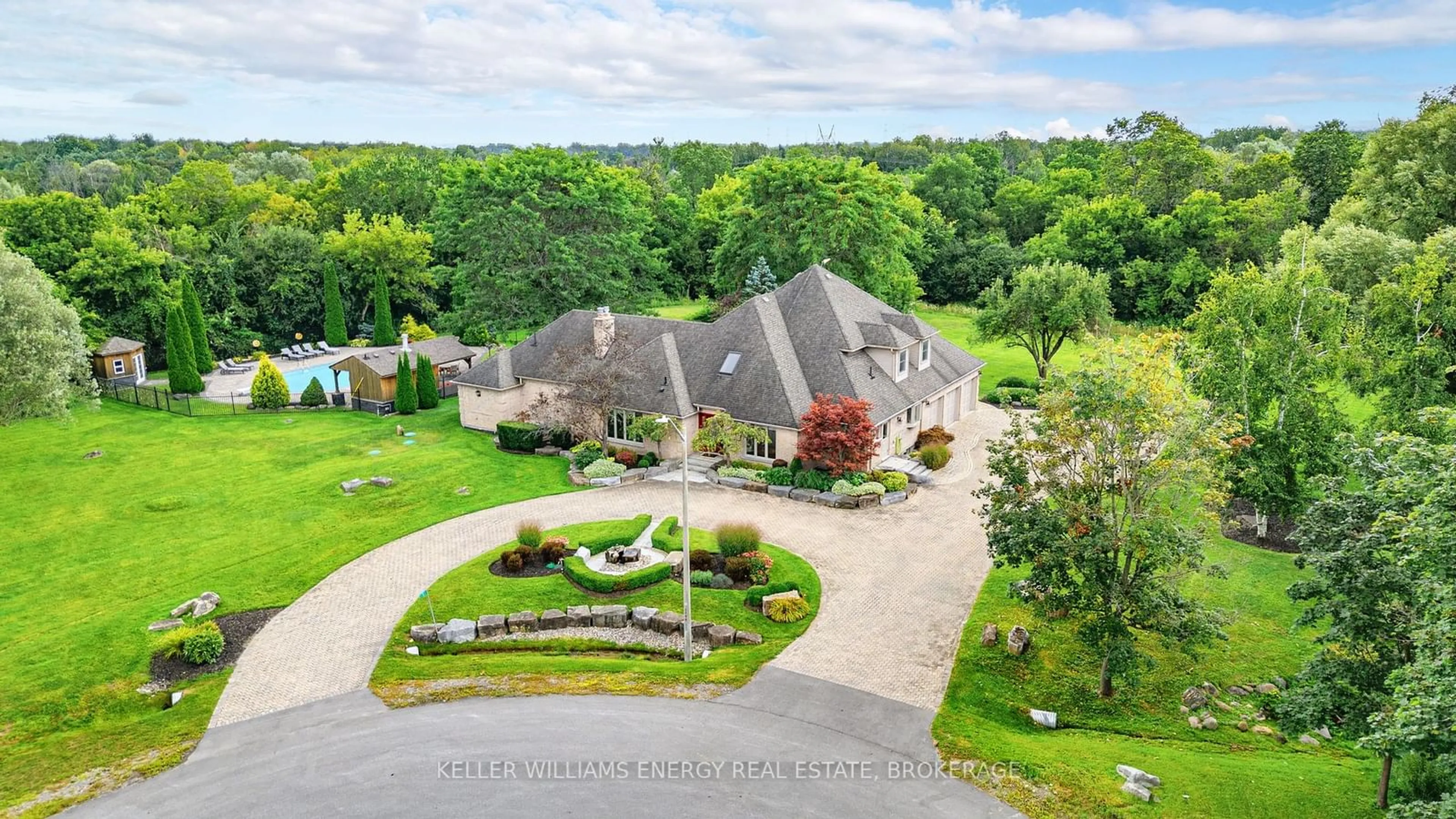 A pic from exterior of the house or condo, the fenced backyard for 5 McNamara Crt, Ajax Ontario L1T 4W6