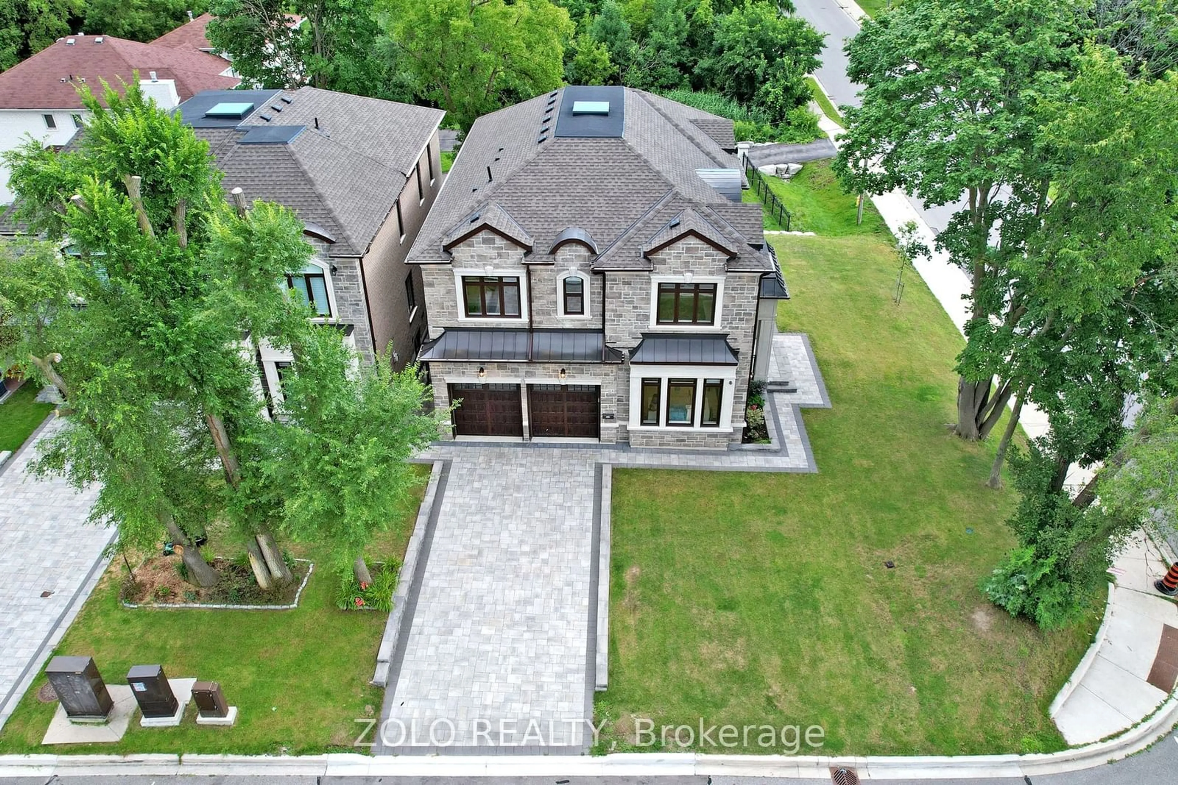 Frontside or backside of a home, the street view for 1 White Ave, Toronto Ontario M1C 1P1