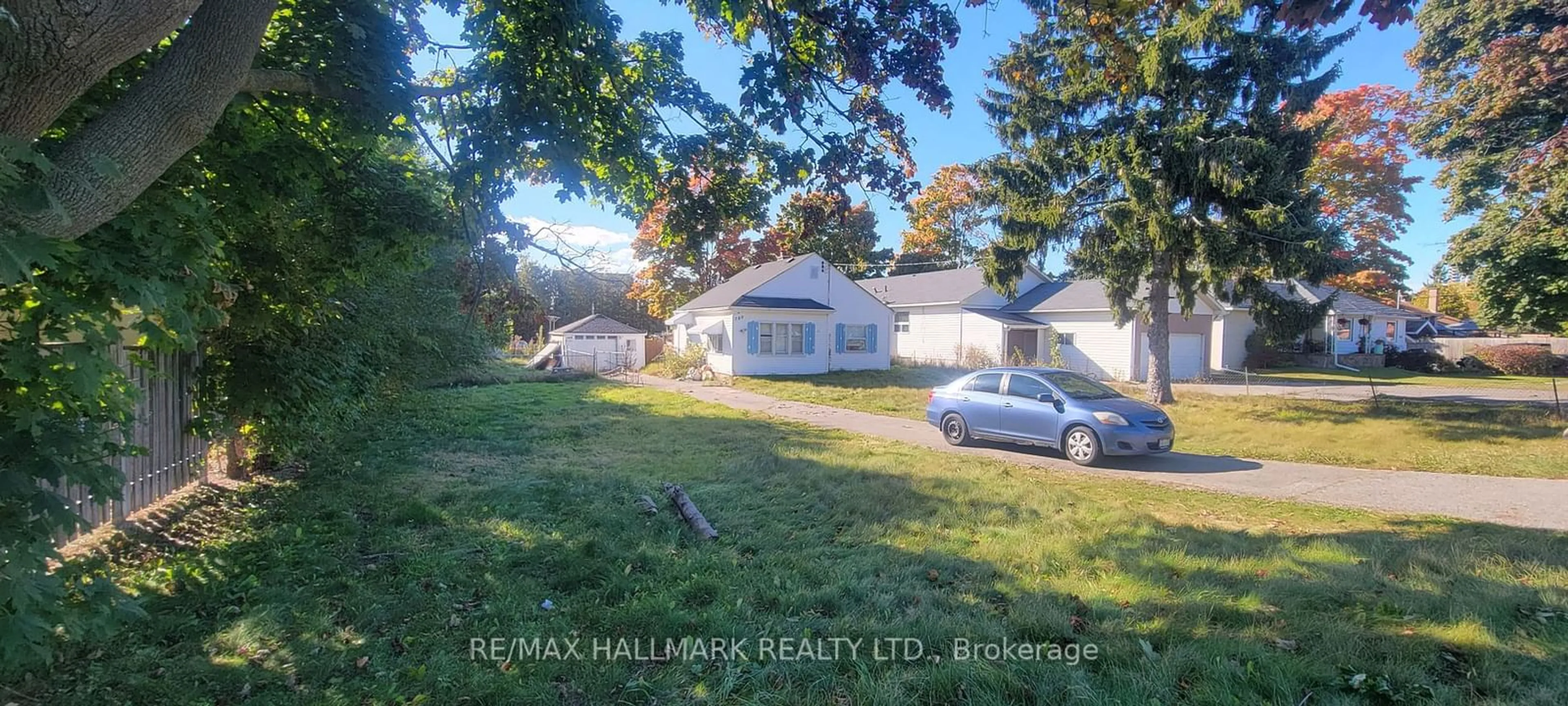 Frontside or backside of a home, the fenced backyard for 780 Liverpool Rd, Pickering Ontario L1W 1S1