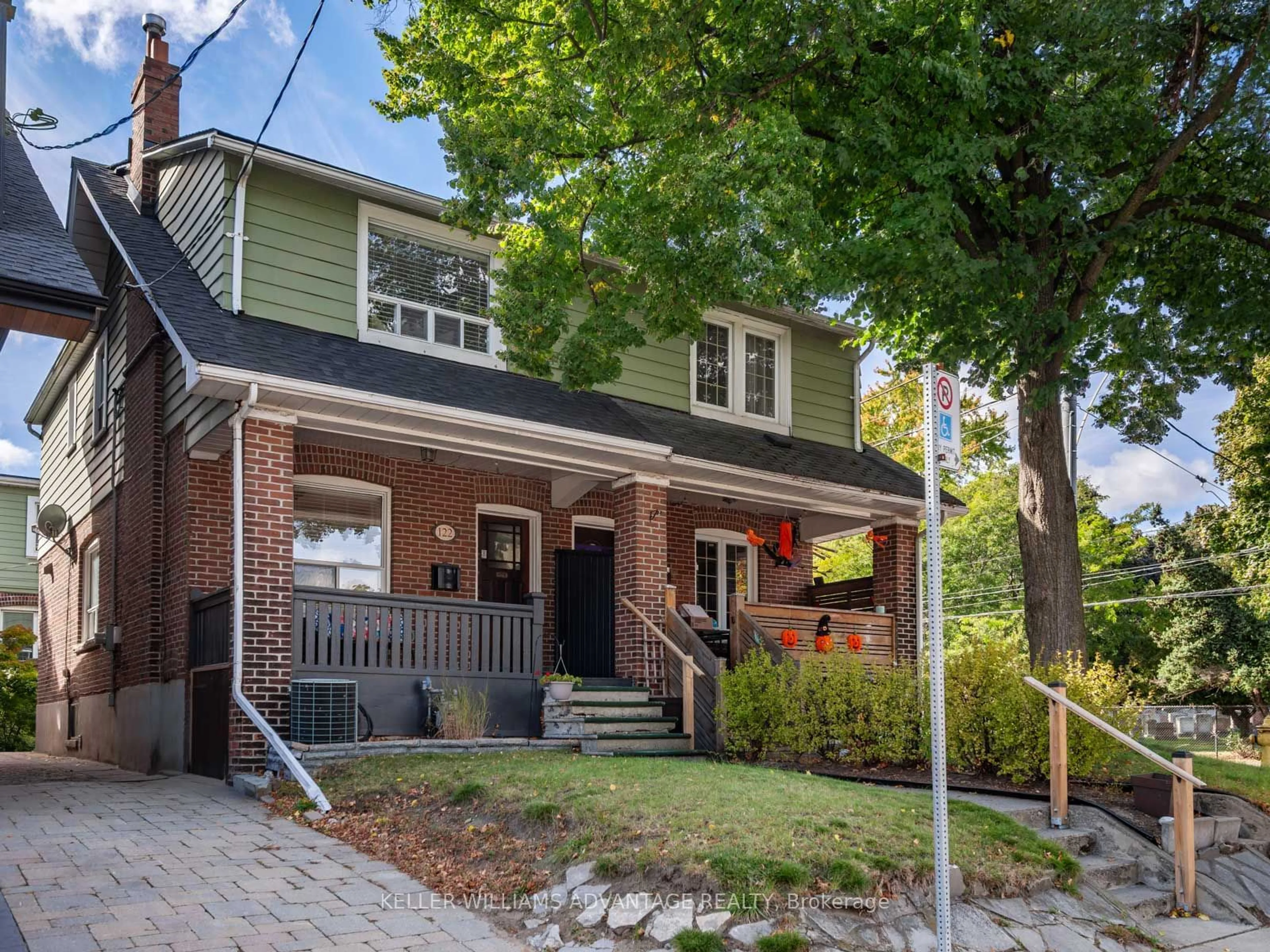 Home with brick exterior material for 122 Rainsford Rd, Toronto Ontario M4L 3N9