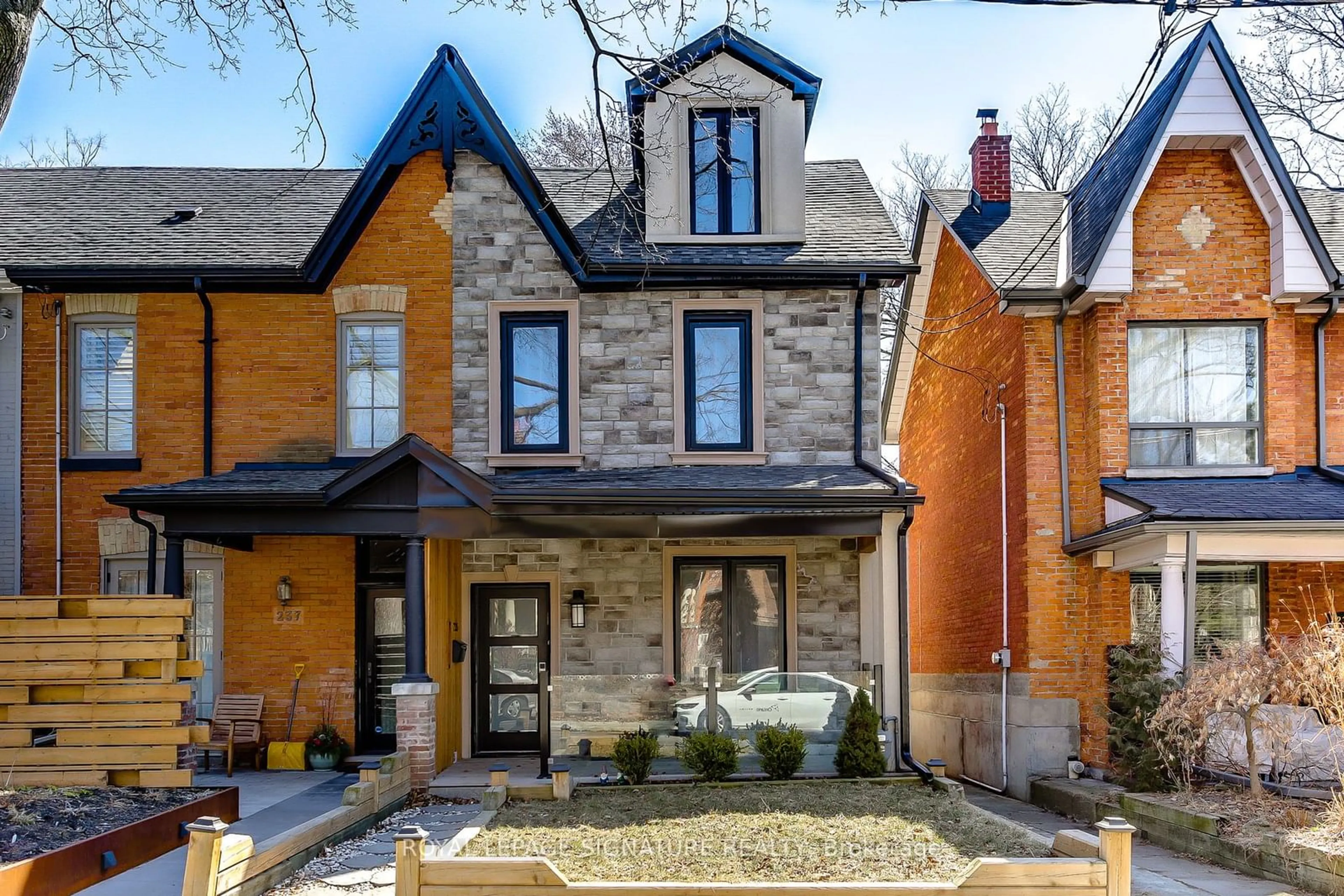 Home with brick exterior material for 235 Bain Ave, Toronto Ontario M4K 1G2