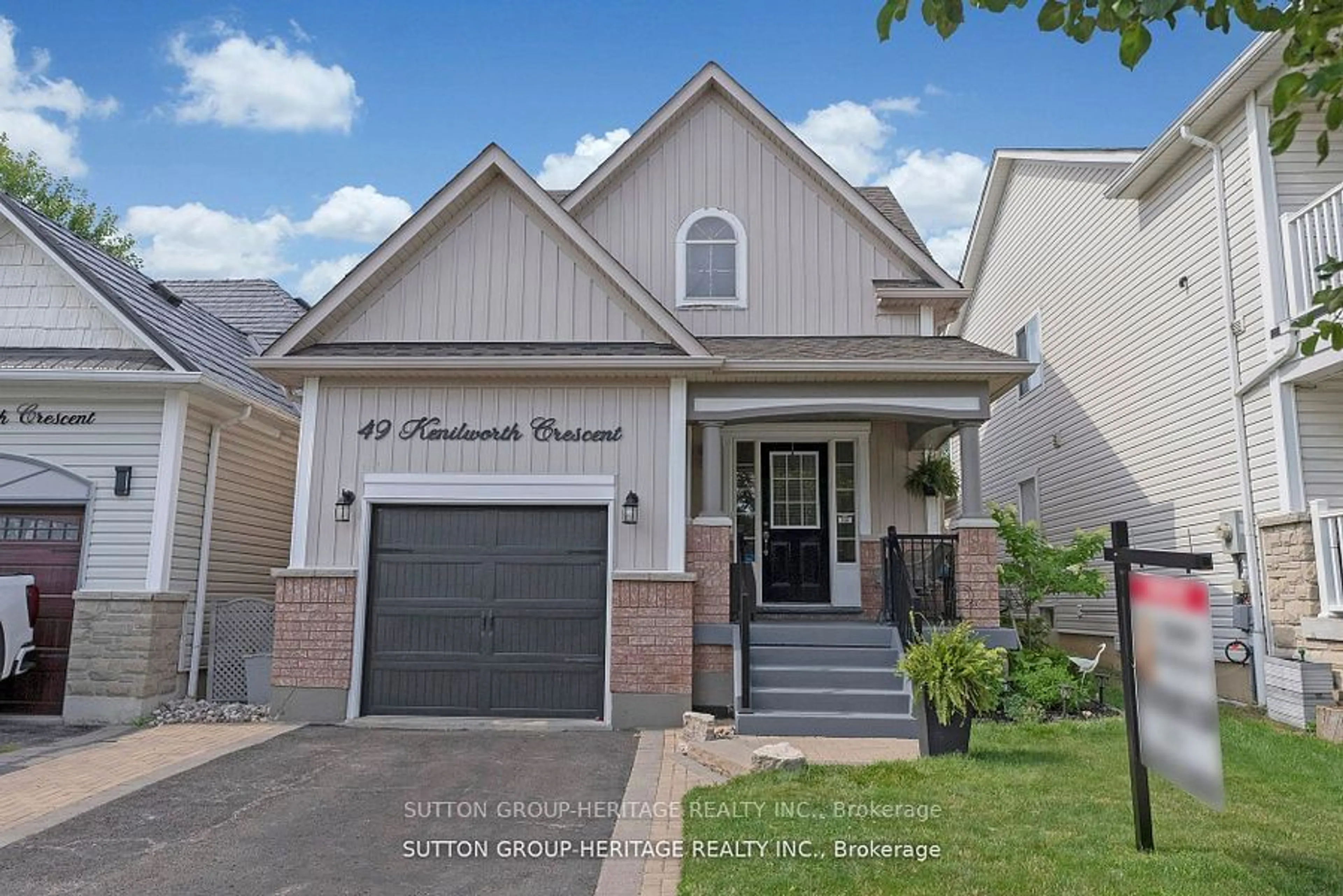 Frontside or backside of a home, the street view for 49 Kenilworth Cres, Whitby Ontario L1M 2M6