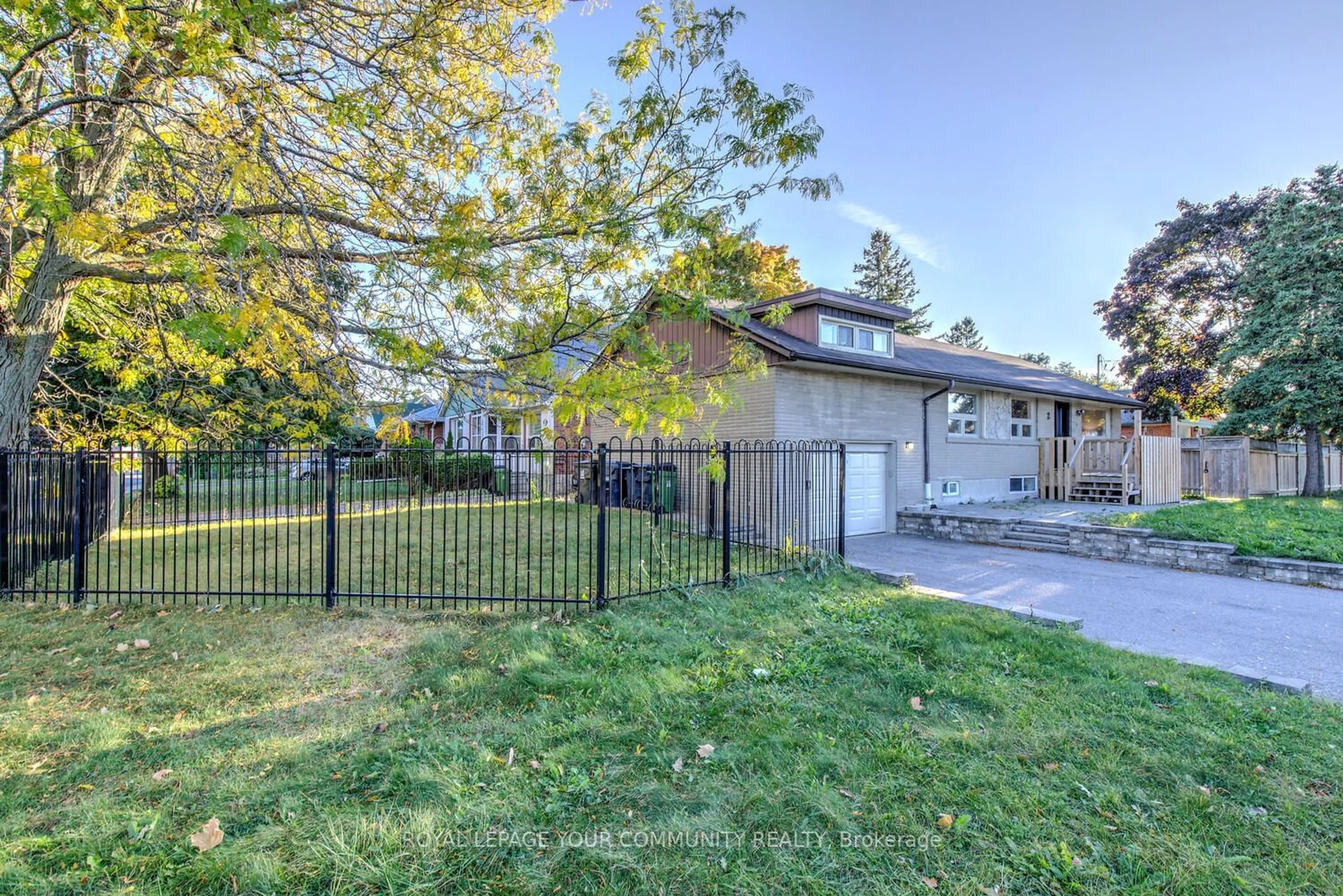 A pic from exterior of the house or condo, the fenced backyard for 2 Christina Cres, Toronto Ontario M1R 4H6