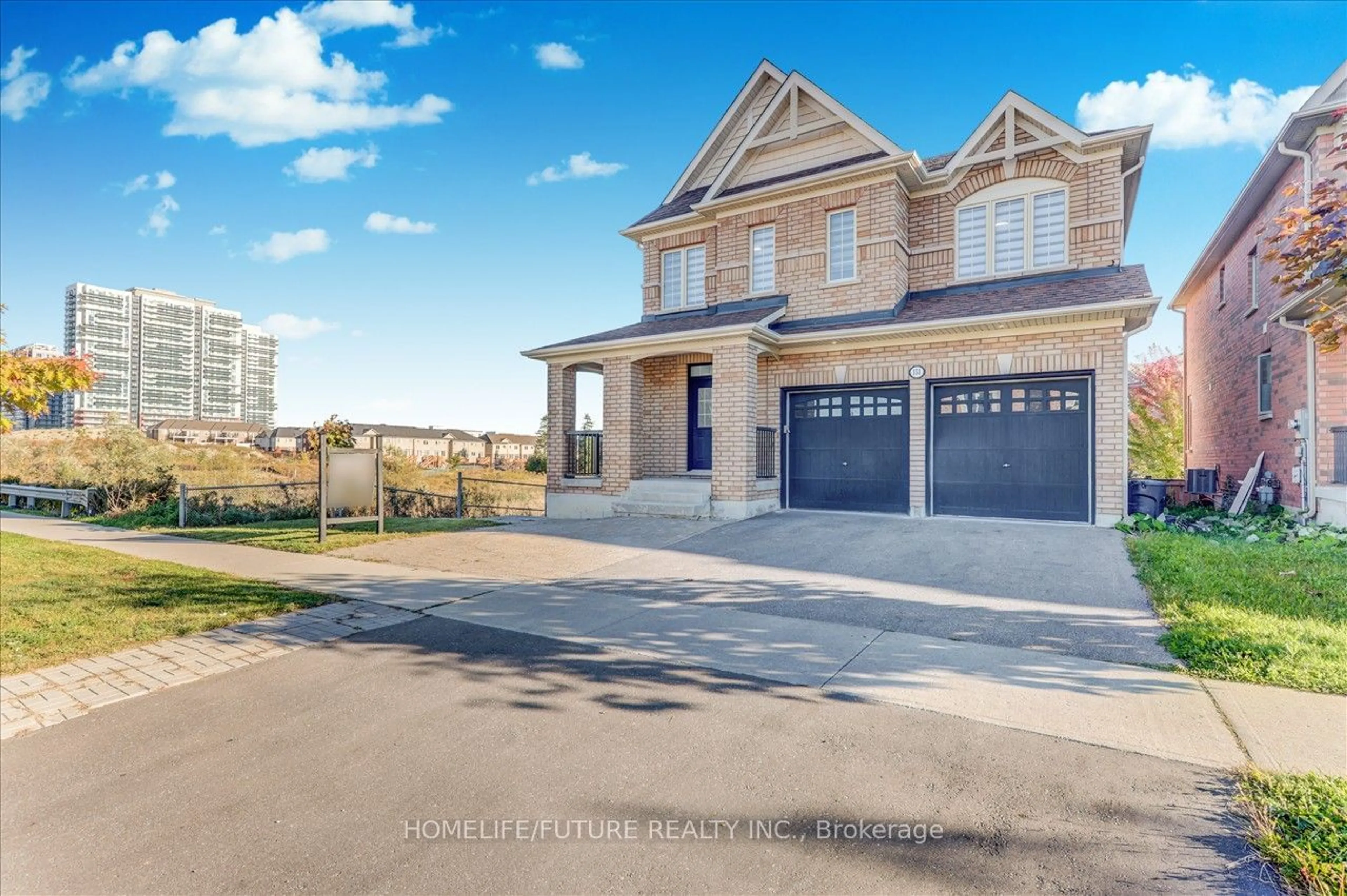 Frontside or backside of a home, the street view for 153 Windfields Farm Dr, Oshawa Ontario L1L 0K2