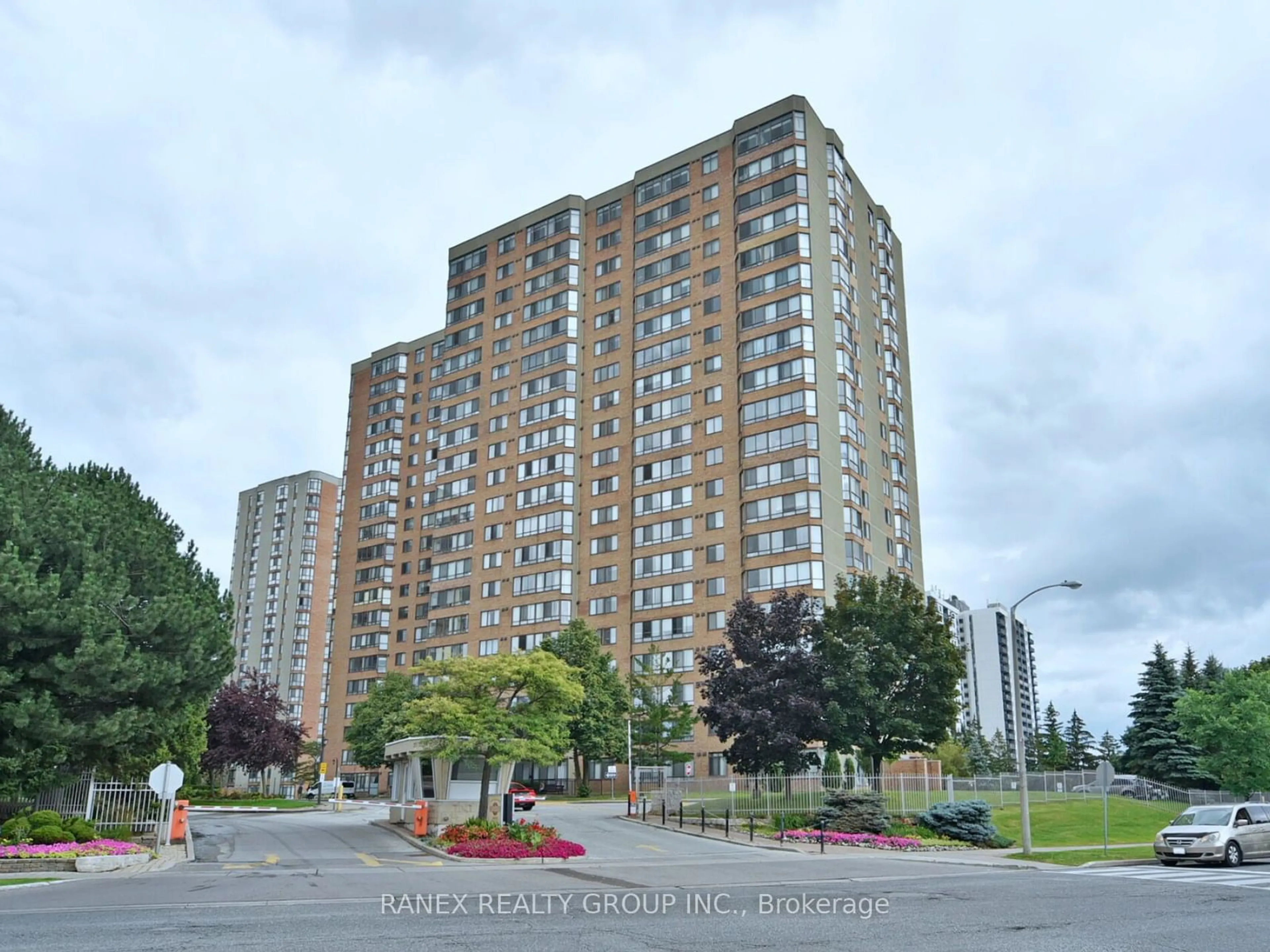 A pic from exterior of the house or condo, the front or back of building for 55 Bamburgh Circ #211, Toronto Ontario M1W 3V4