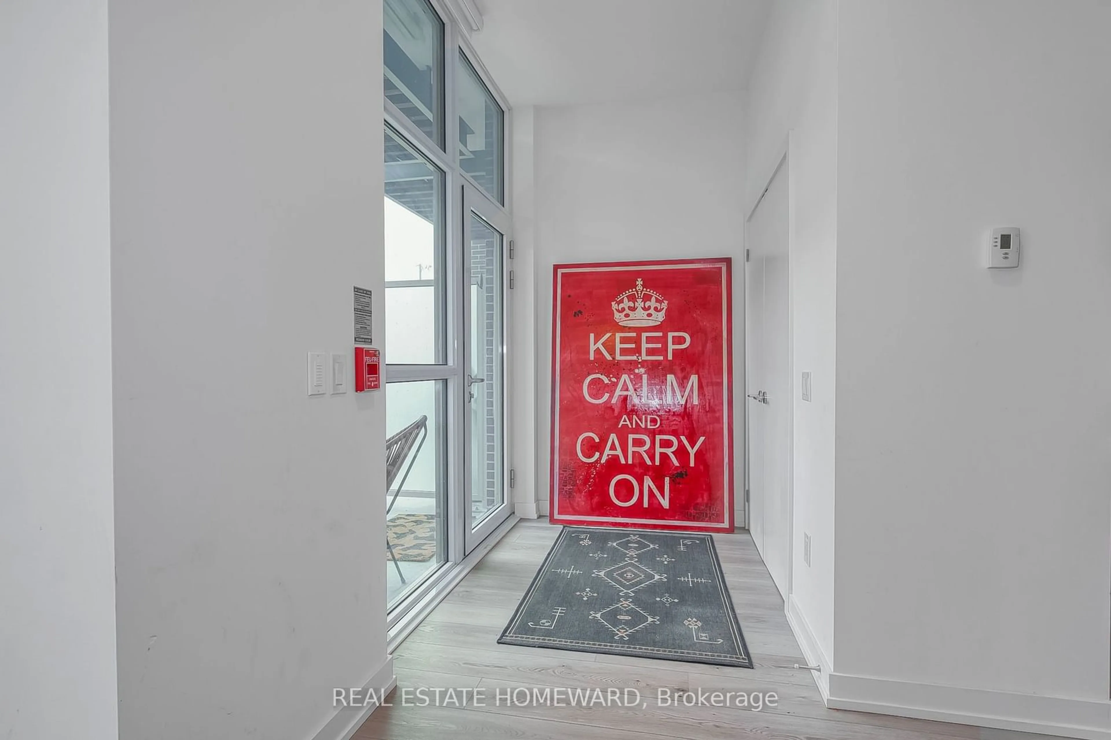 Indoor foyer, carpet floors for 156 Logan Ave #131, Toronto Ontario M4M 2N3