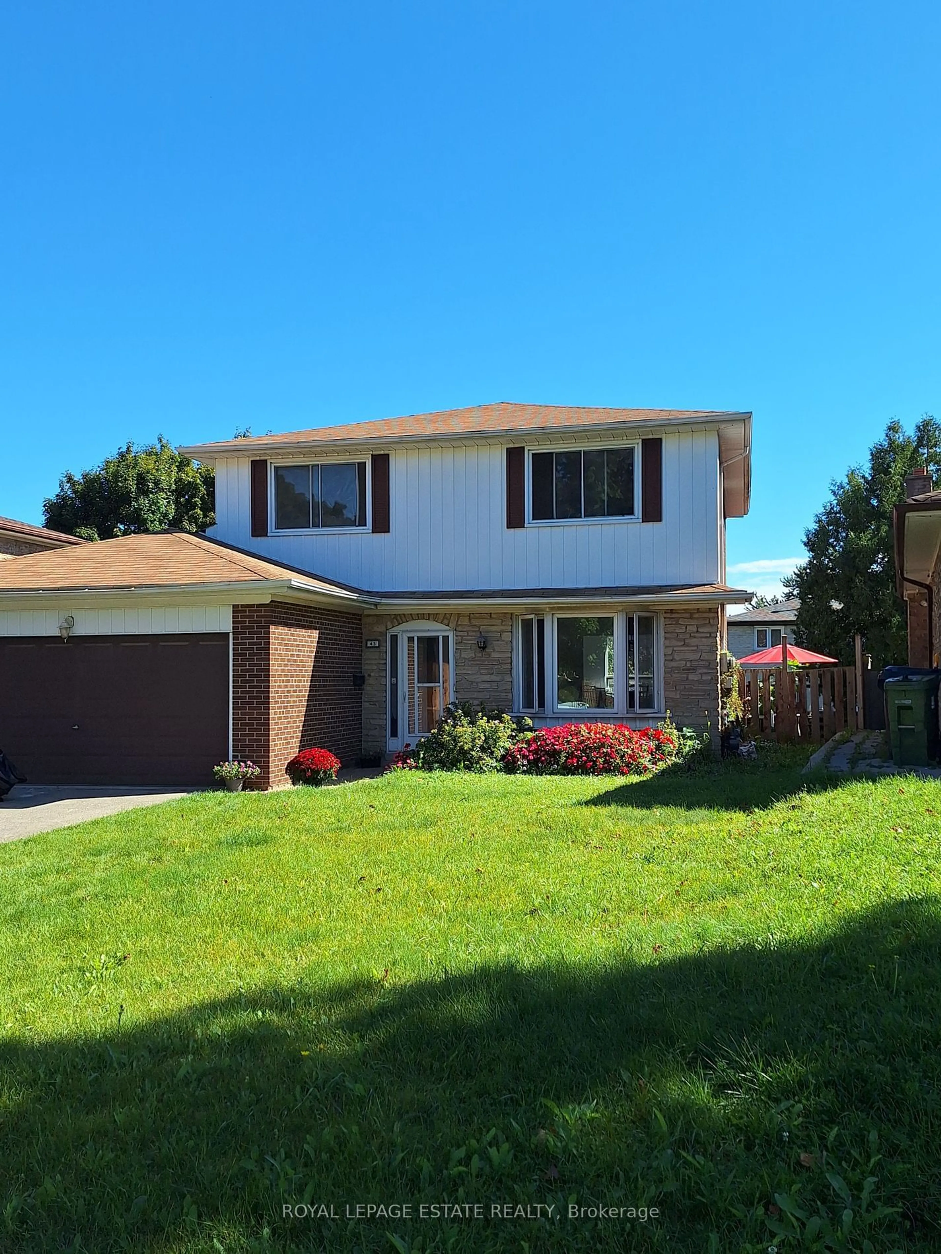 Frontside or backside of a home, the fenced backyard for 43 Boarhill Dr, Toronto Ontario M1S 2L9