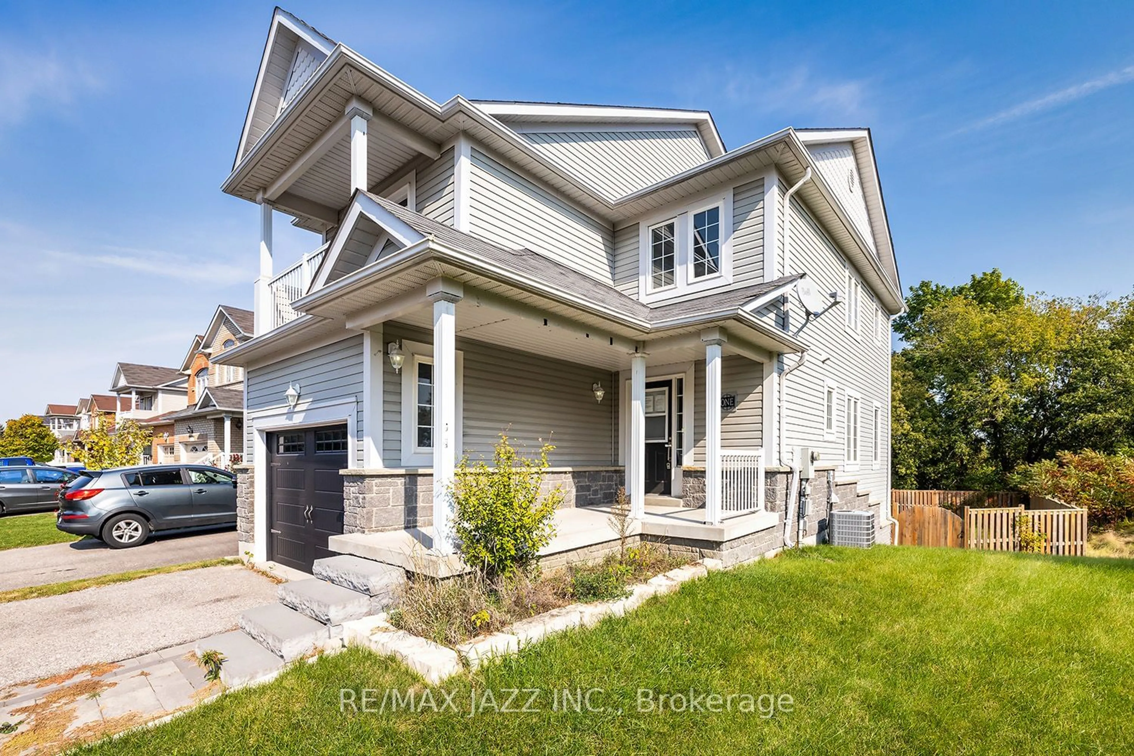 Frontside or backside of a home, the fenced backyard for 1 Crough St, Clarington Ontario L1C 5M5