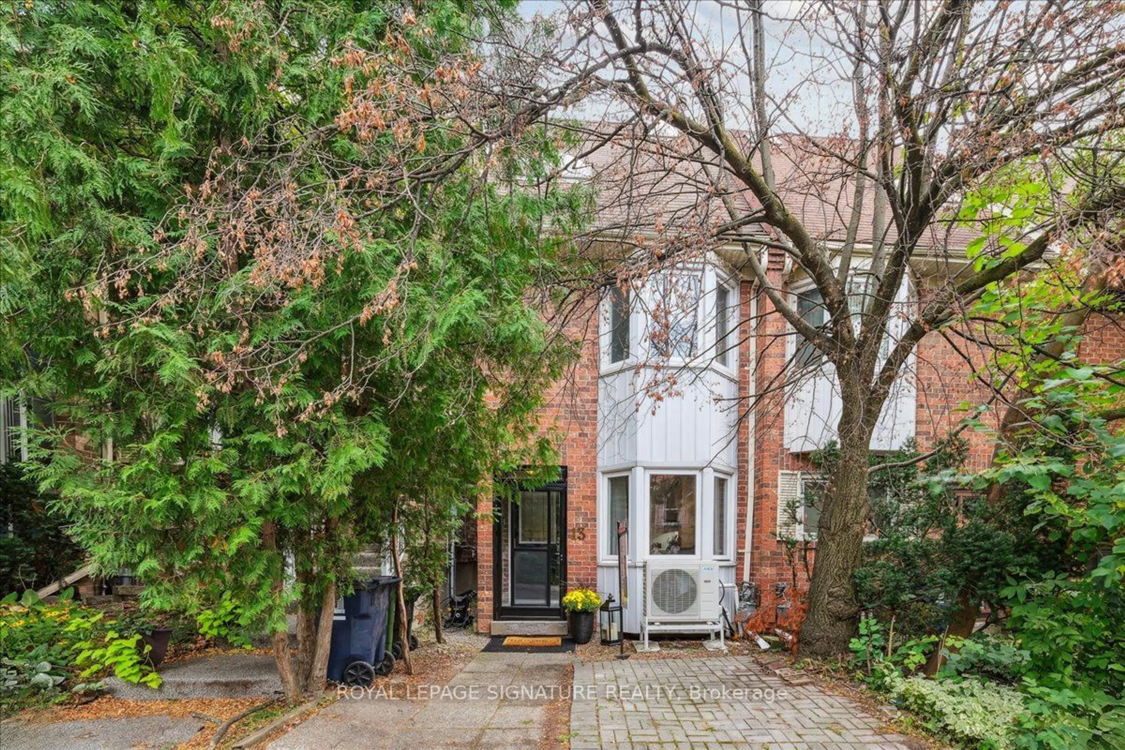 A pic from exterior of the house or condo, the street view for 13 Unity Rd, Toronto Ontario M4J 5A3