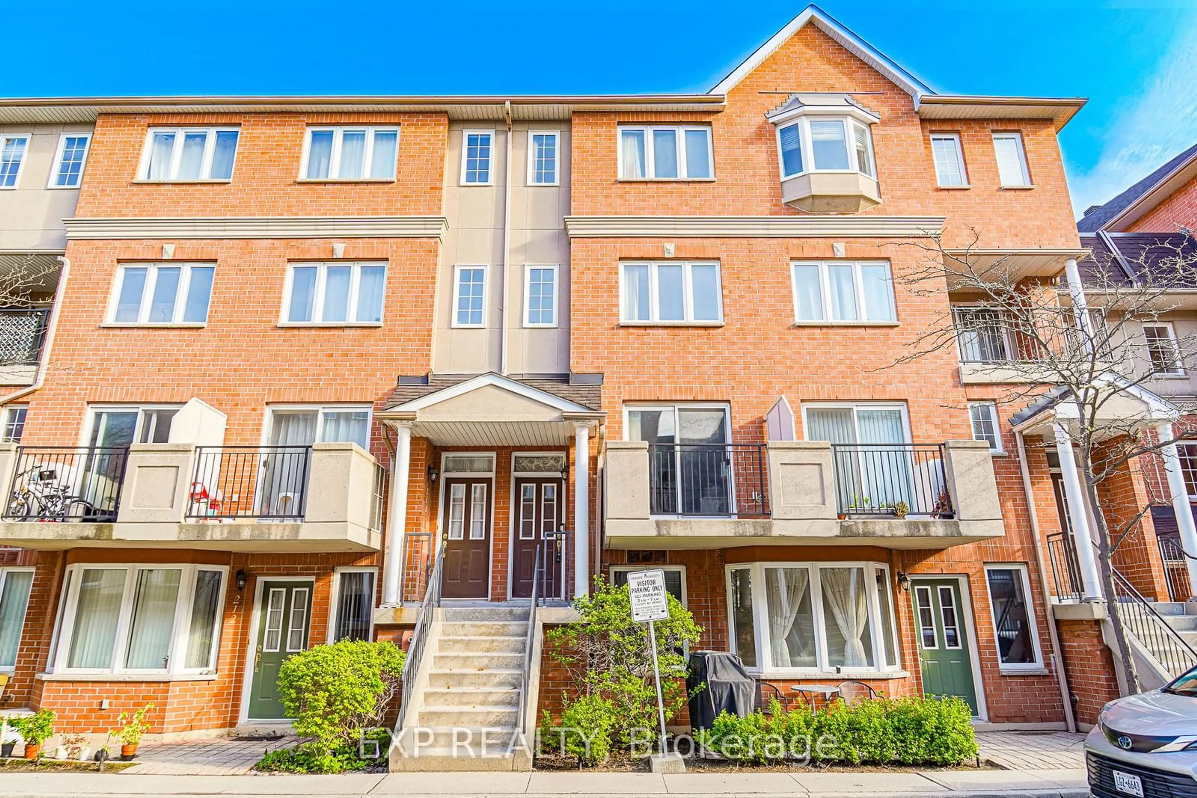 A pic from exterior of the house or condo, the street view for 1881 Mcnicoll Ave #215, Toronto Ontario M1V 5E9