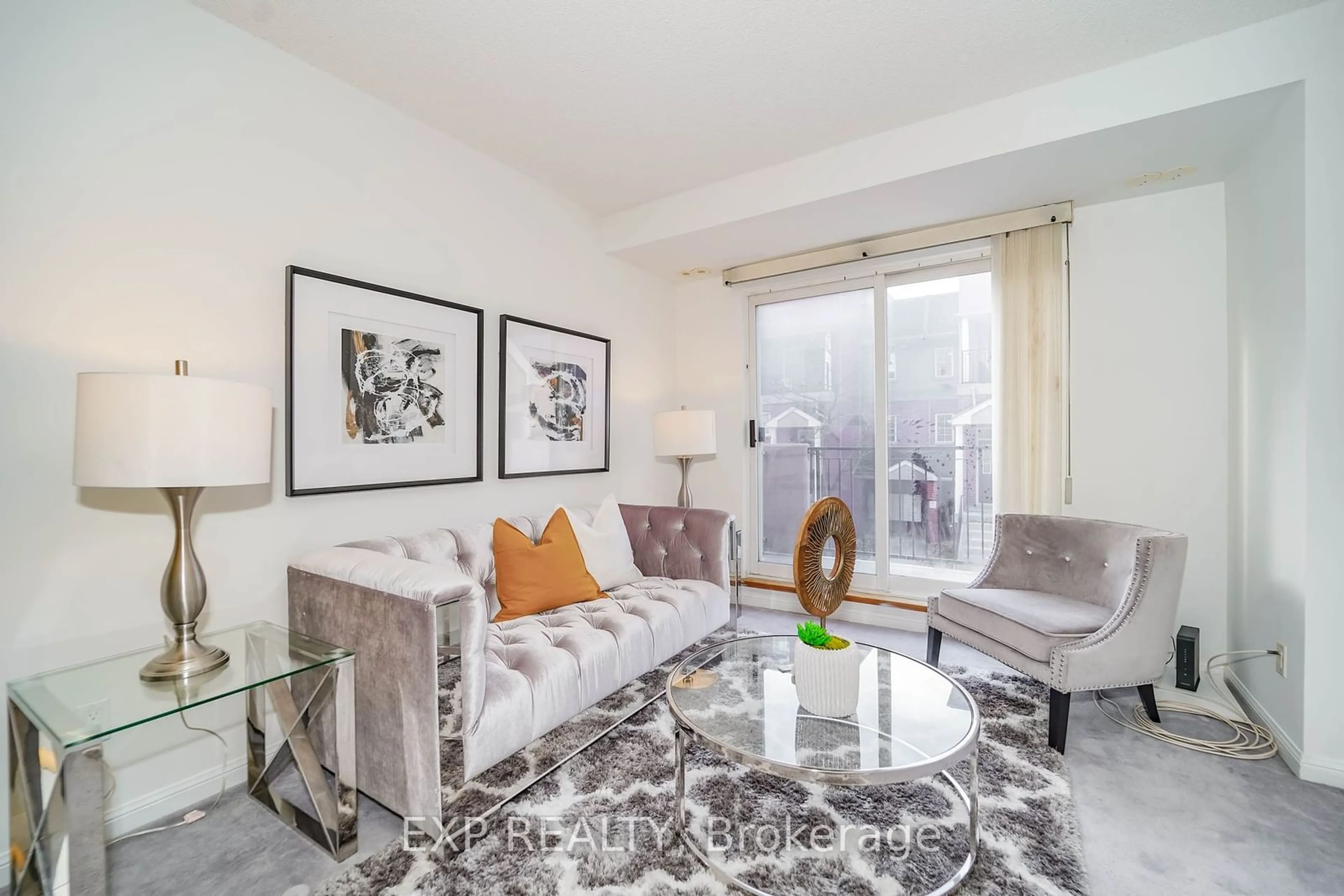 Living room, carpet floors for 1881 Mcnicoll Ave #215, Toronto Ontario M1V 5E9