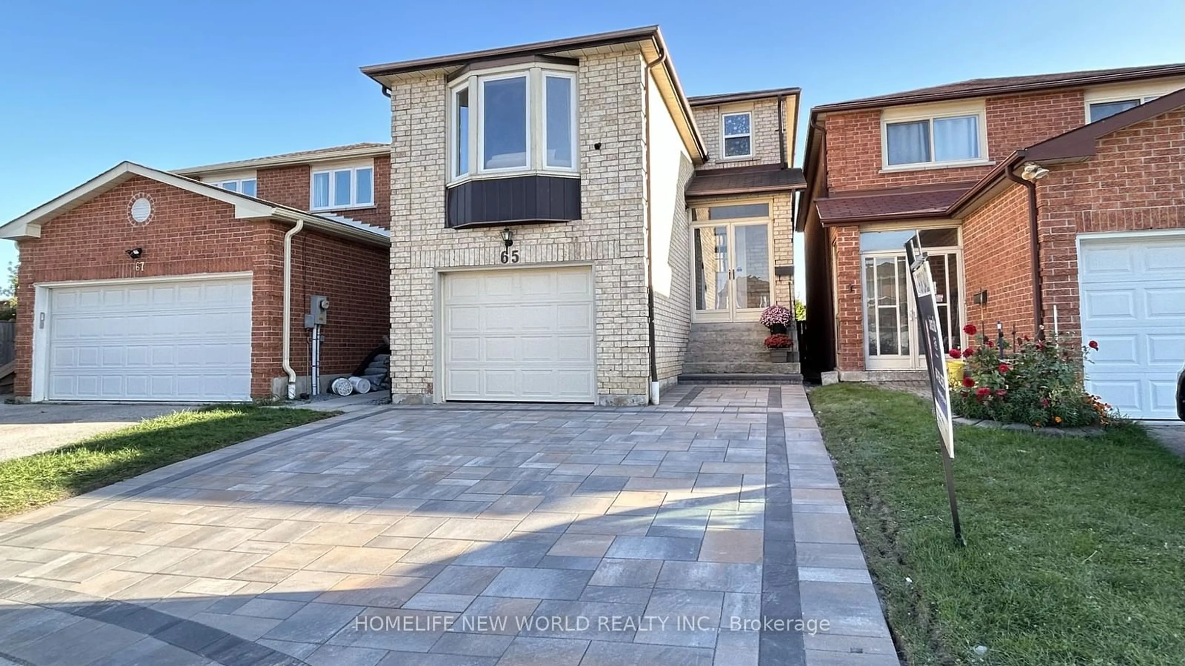 Home with brick exterior material for 65 Fort Dearborn Dr, Toronto Ontario M1V 3A6