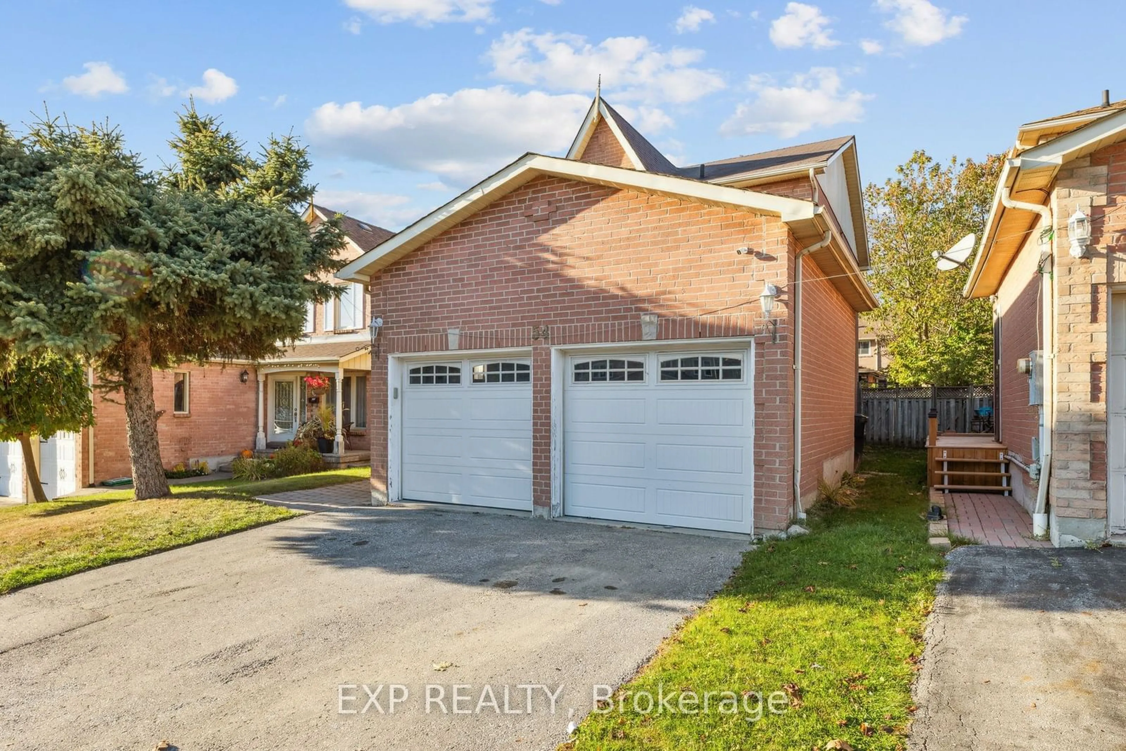 Frontside or backside of a home, the street view for 54 Magill Dr, Ajax Ontario L1T 3H8