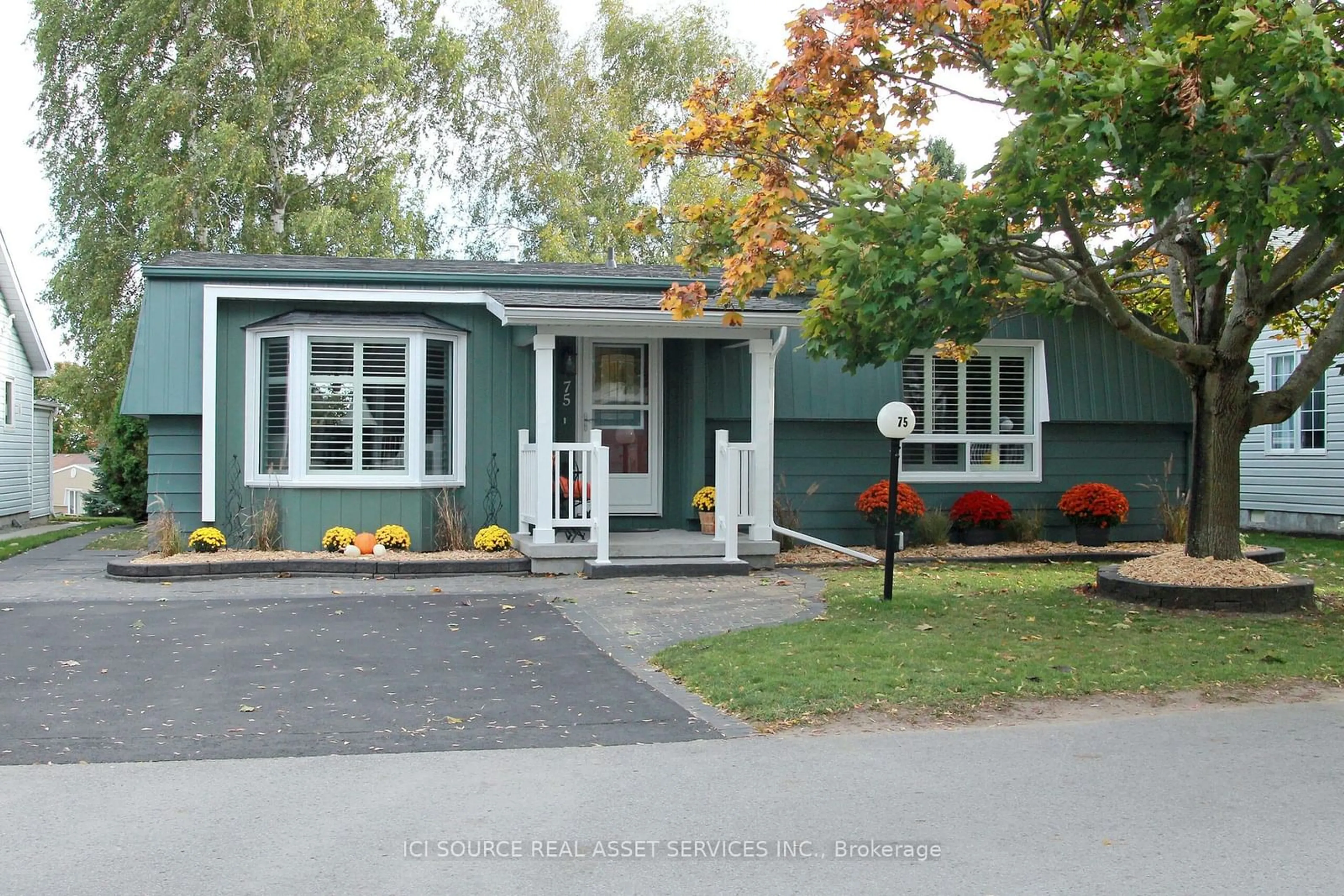 Home with vinyl exterior material for 75 Wilmot Tr, Clarington Ontario L1B 1B8