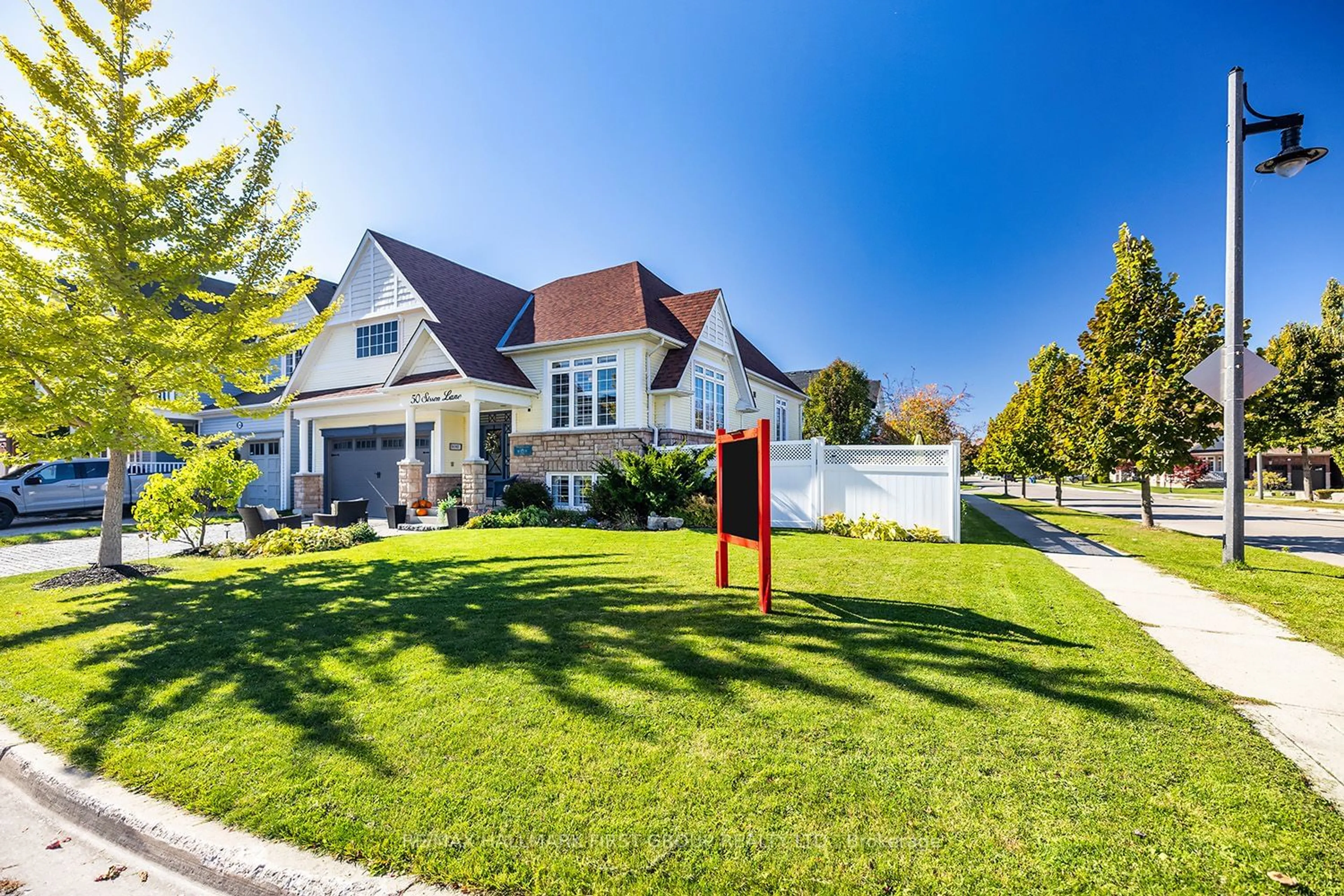 Frontside or backside of a home, the fenced backyard for 50 Sisson Lane, Clarington Ontario L1B 0A7