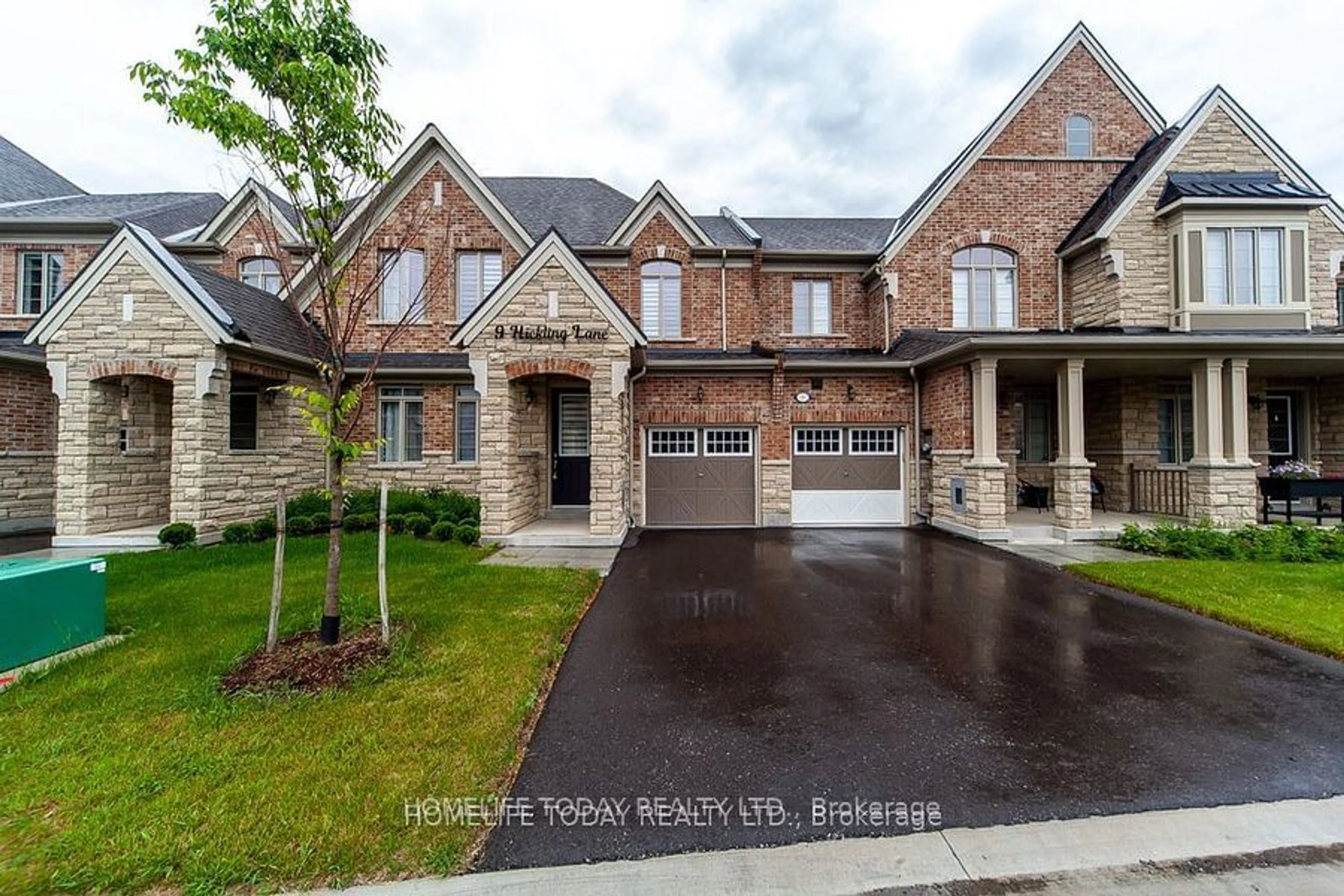 Home with brick exterior material for 9 Hickling Lane, Ajax Ontario L1T 4R1