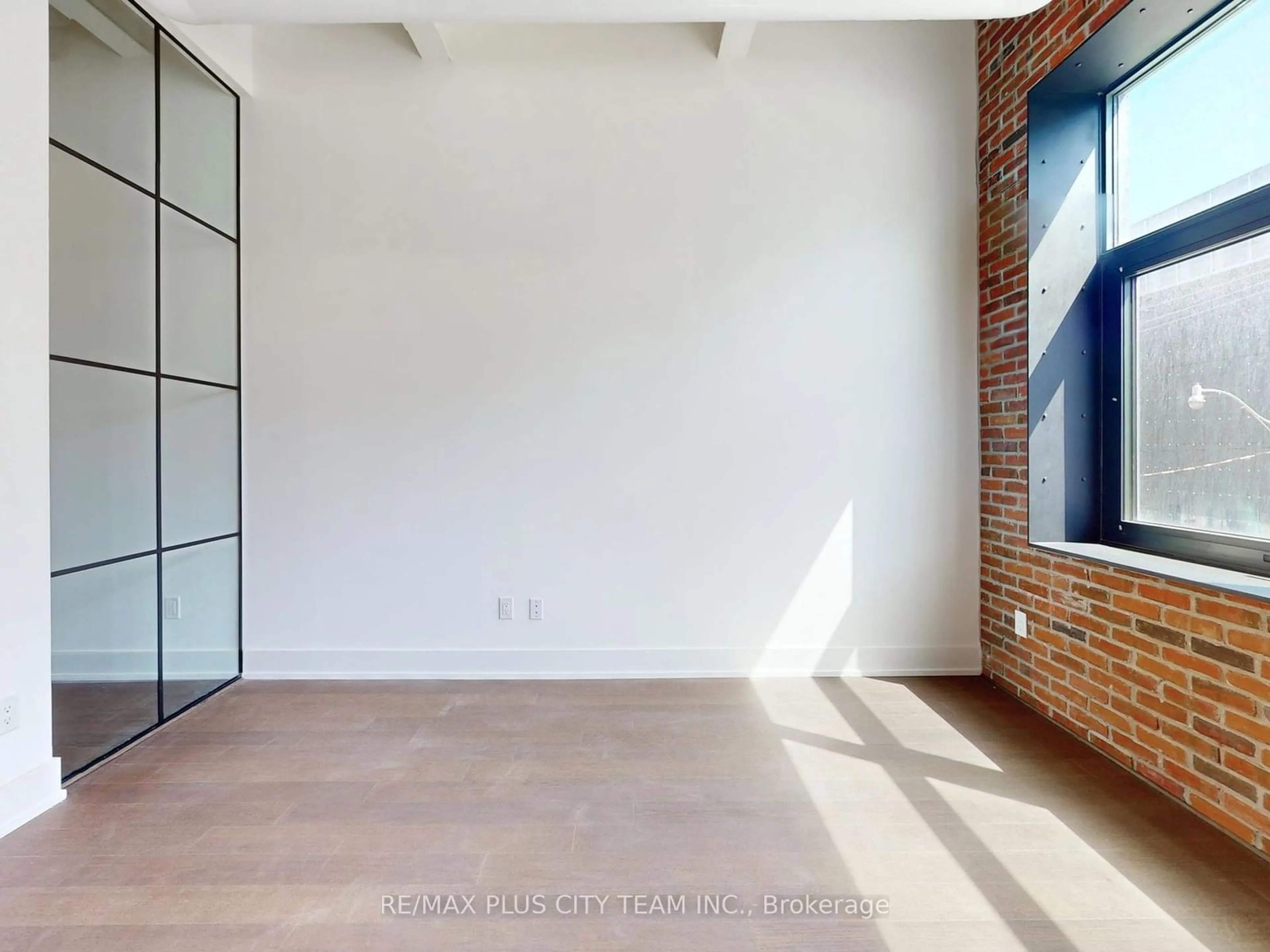 A pic of a room, wood floors for 150 Logan Ave #206, Toronto Ontario M4M 0E4