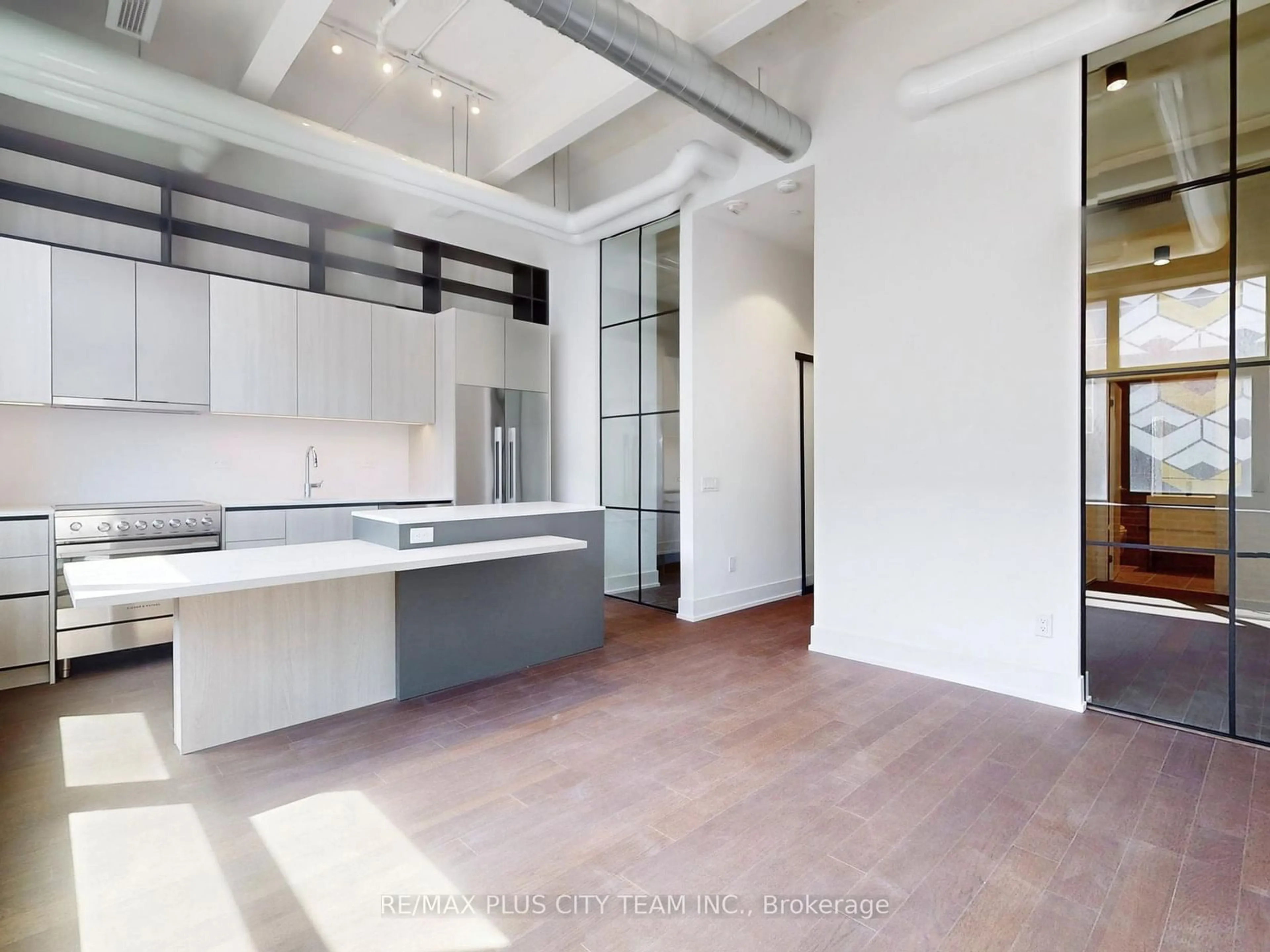 Open concept kitchen for 150 Logan Ave #206, Toronto Ontario M4M 0E4