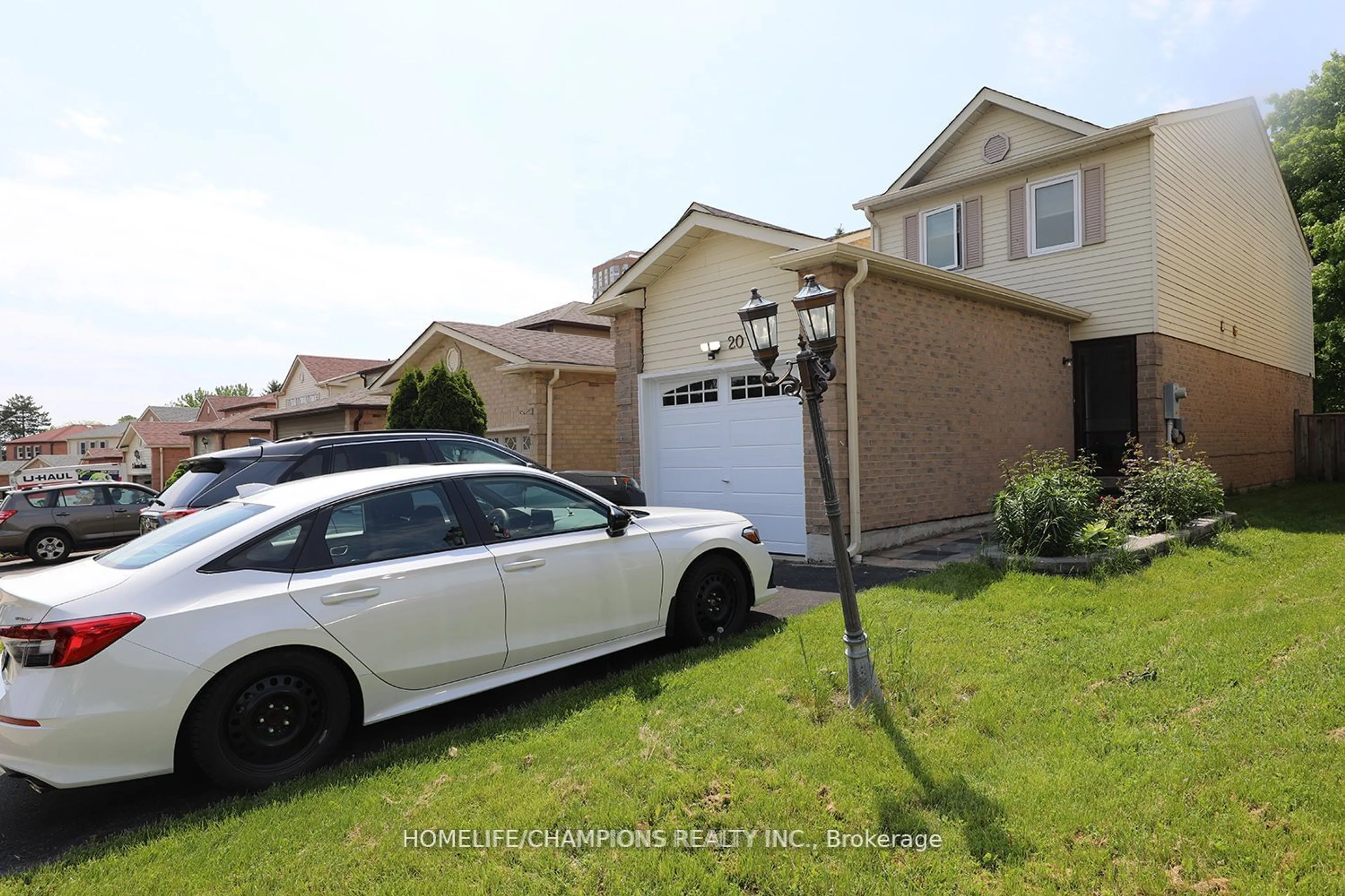 Frontside or backside of a home, the street view for 20 Horseshoe Cres, Toronto Ontario M1B 4S5