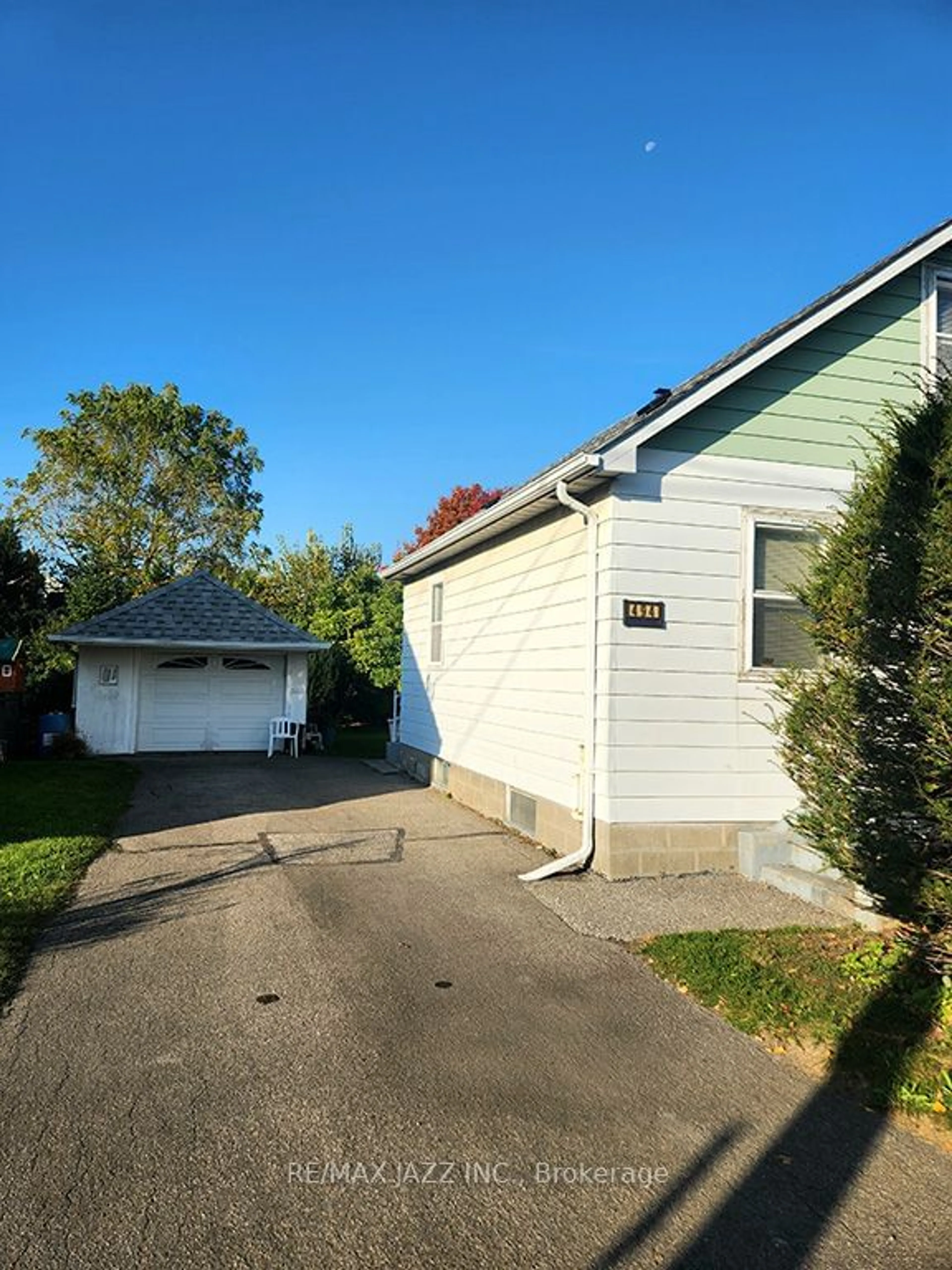 Frontside or backside of a home, the fenced backyard for 494 Drew St, Oshawa Ontario L1H 5B7