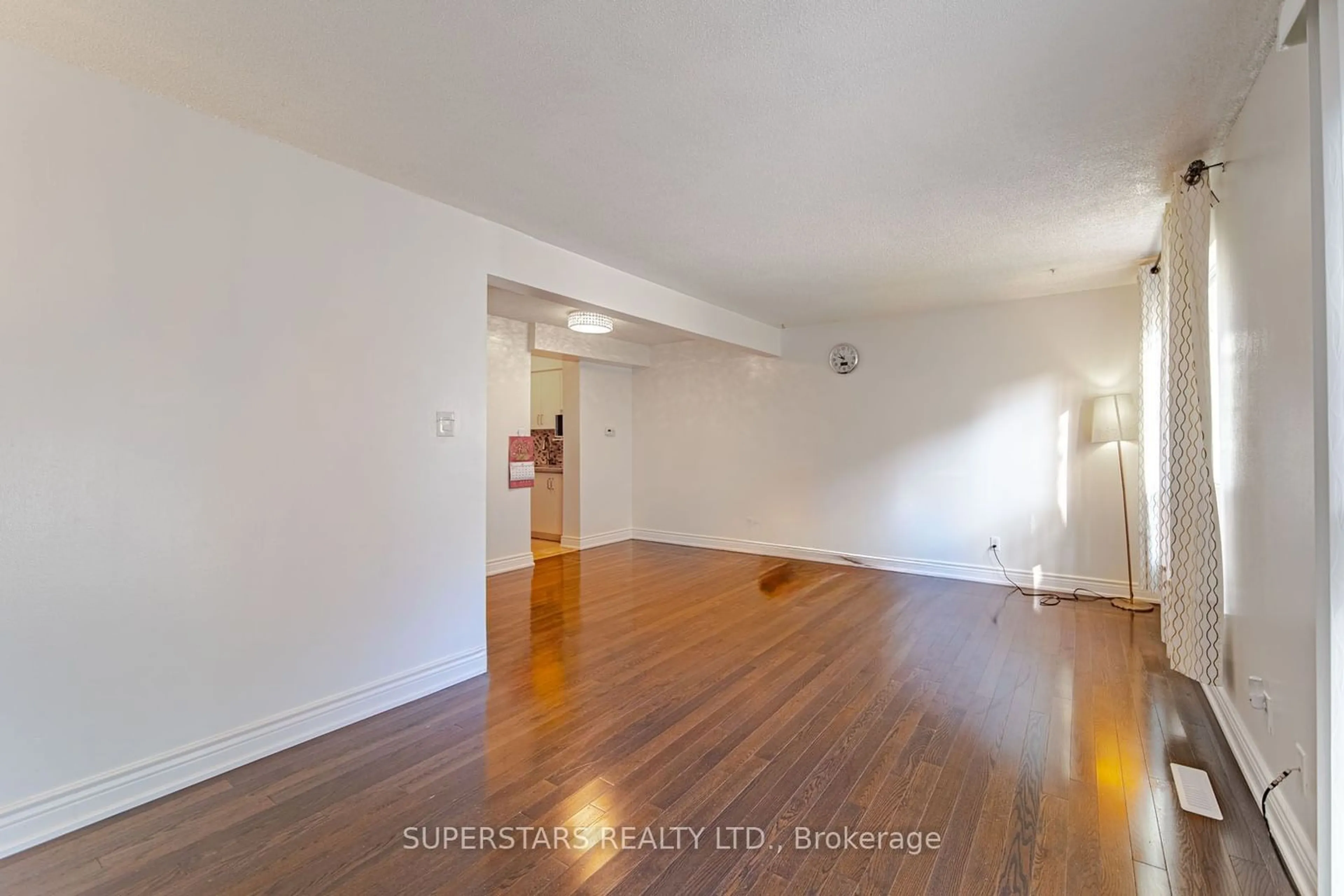 A pic of a room, wood floors for 126 Dusay Pl #123, Toronto Ontario M1W 2N2