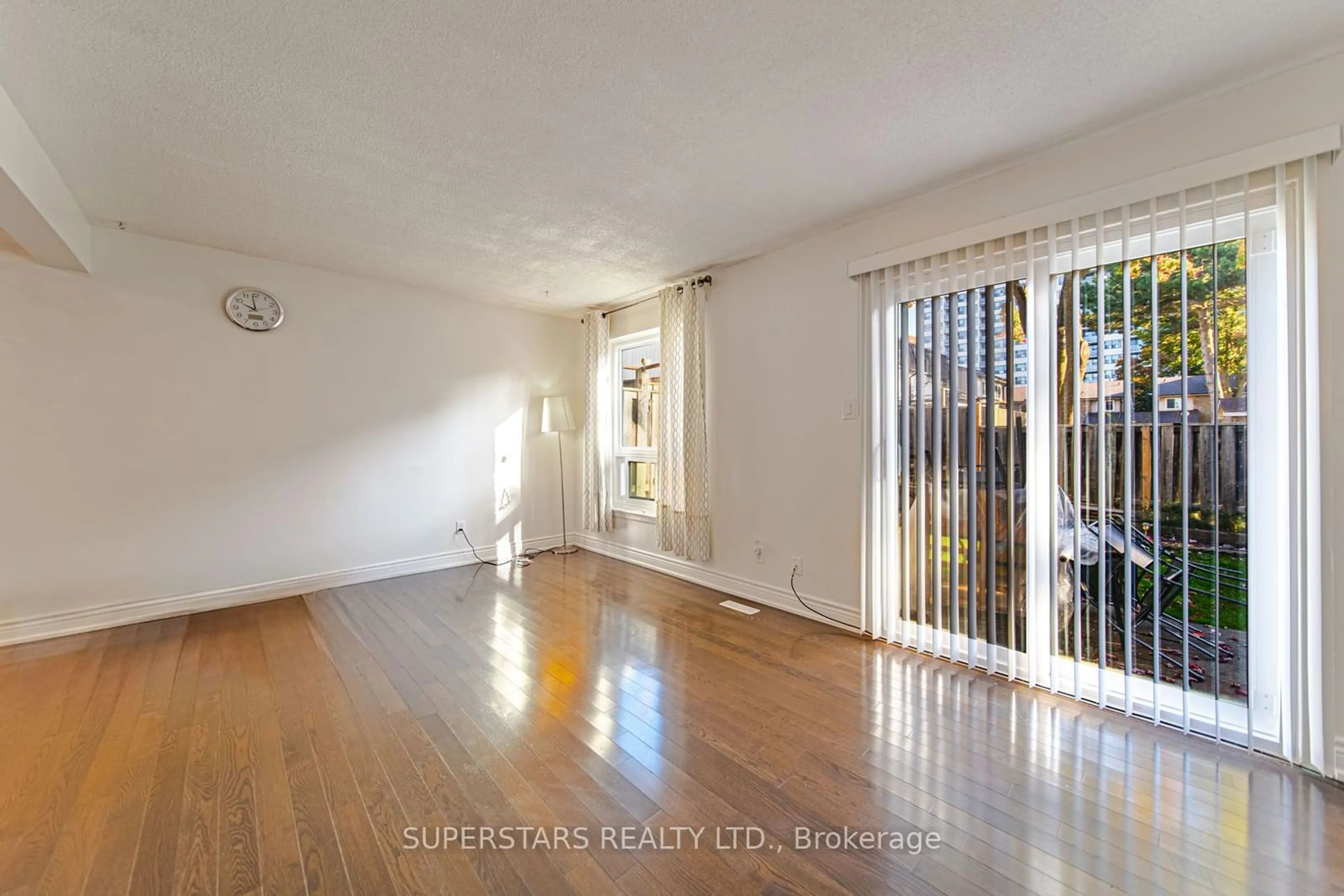 A pic of a room, wood floors for 126 Dusay Pl #123, Toronto Ontario M1W 2N2