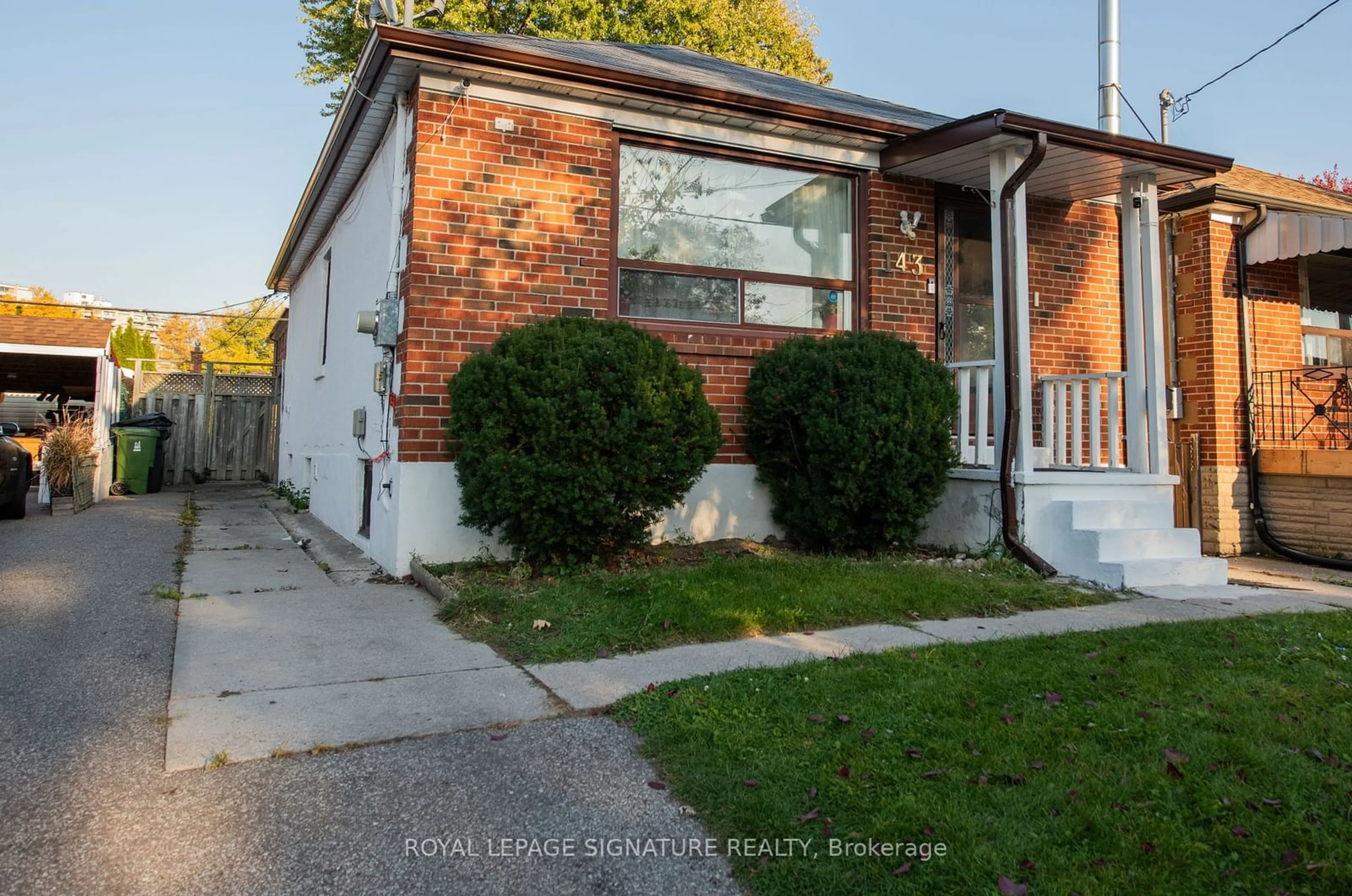 Frontside or backside of a home, the street view for 143 Magnolia Ave, Toronto Ontario M1K 3K7