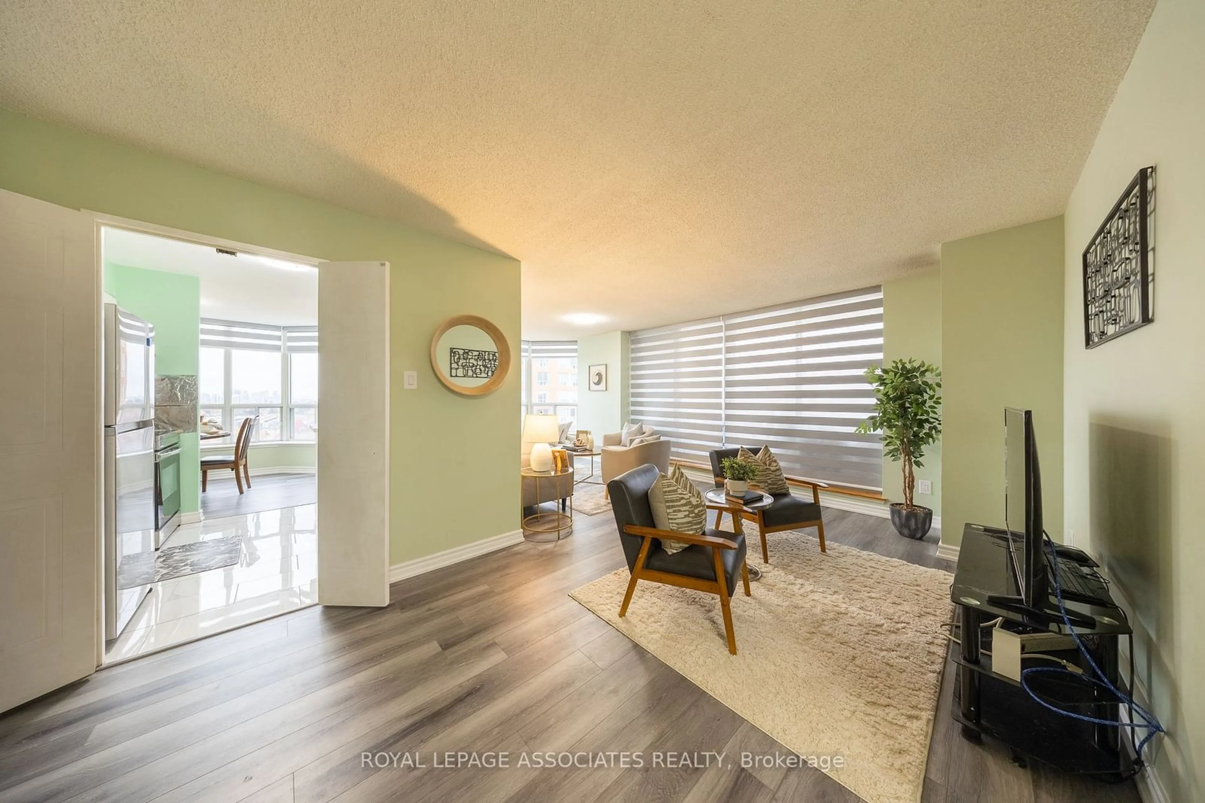 A pic of a room, wood floors for 410 Mclevin Ave #1608, Toronto Ontario M1B 5J5