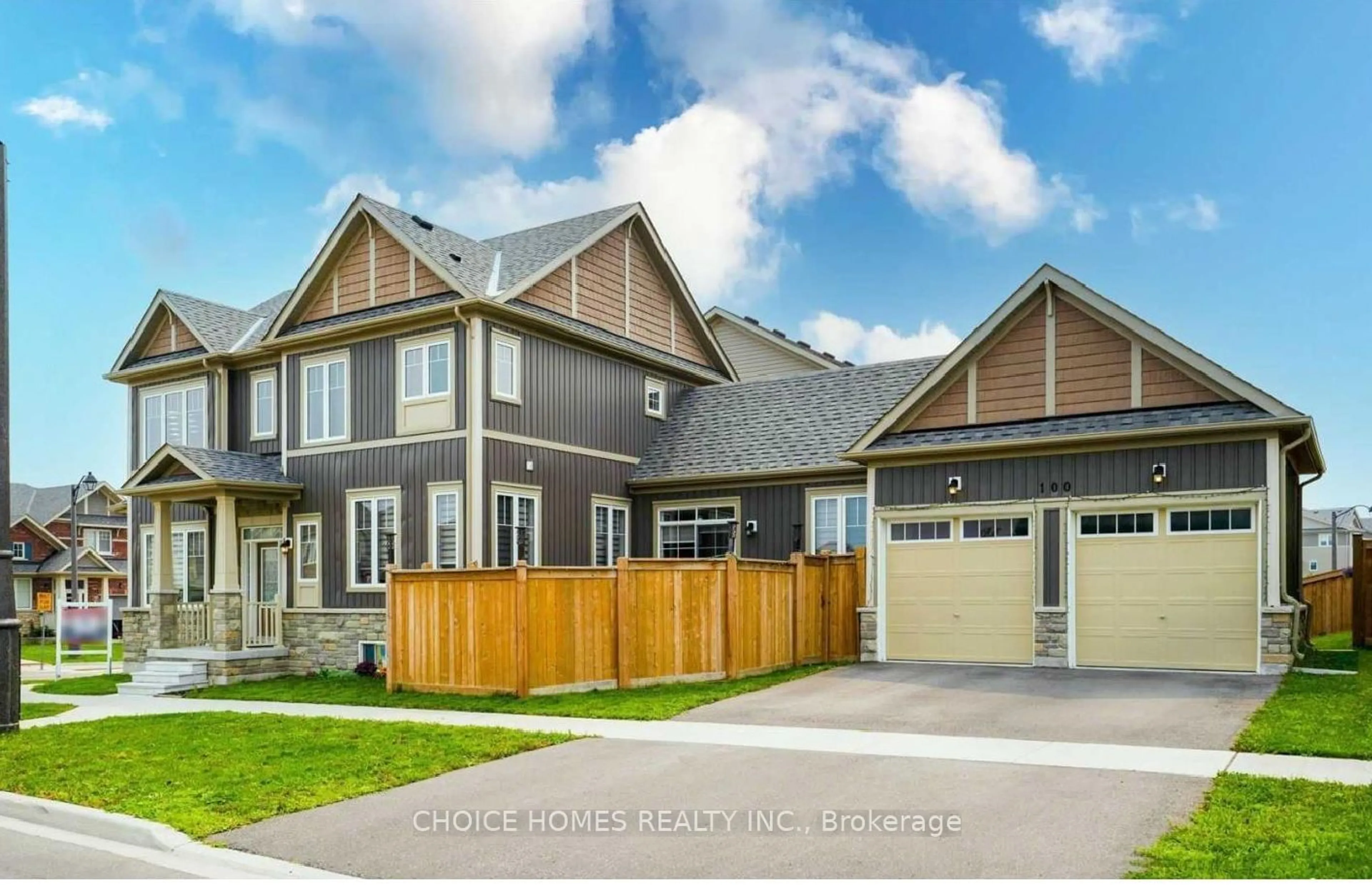 Frontside or backside of a home, the fenced backyard for 100 Great Gabe Gate, Oshawa Ontario L1L 0G8