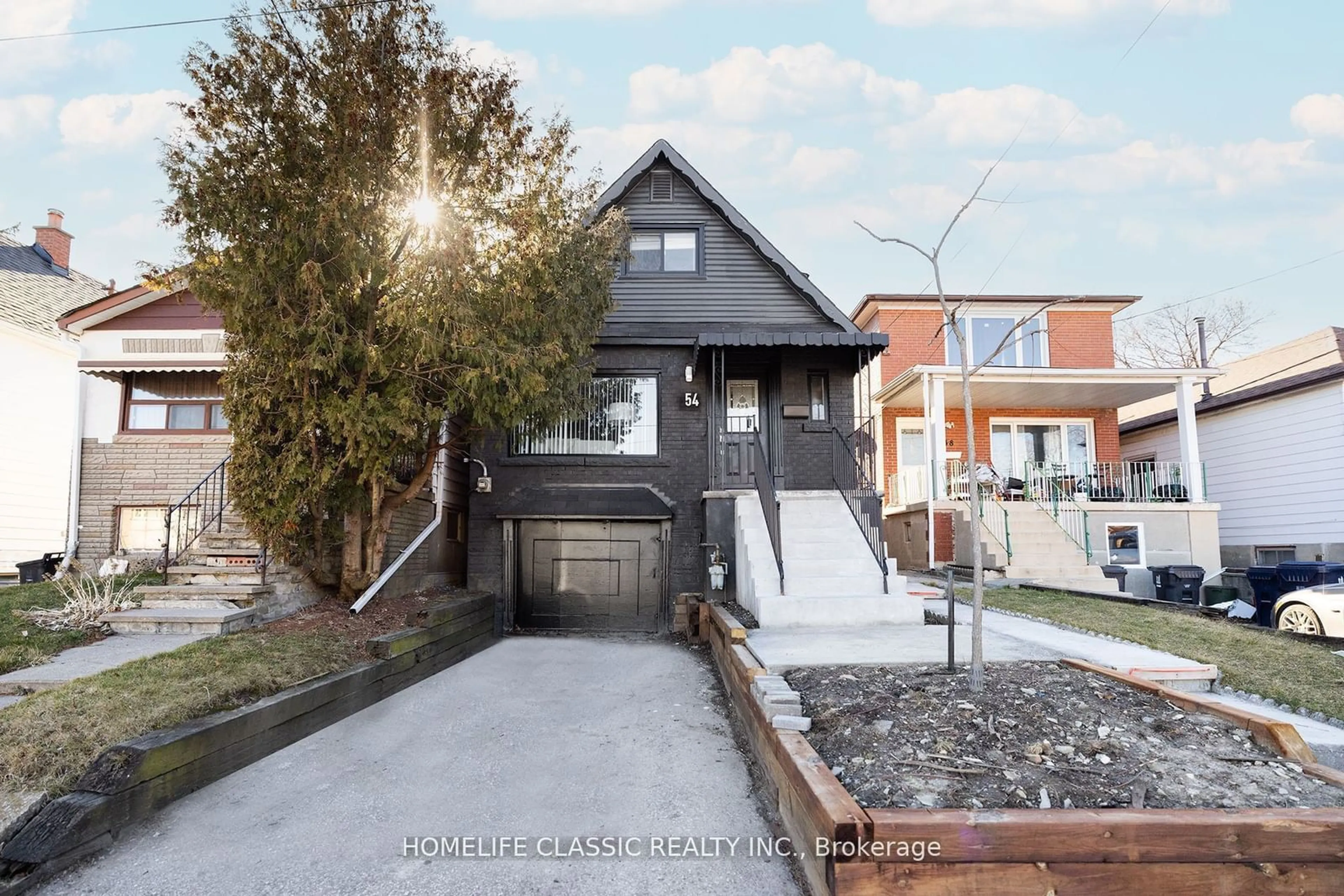 Frontside or backside of a home, the street view for 54 S Woodrow Blvd, Toronto Ontario M1N 3L6